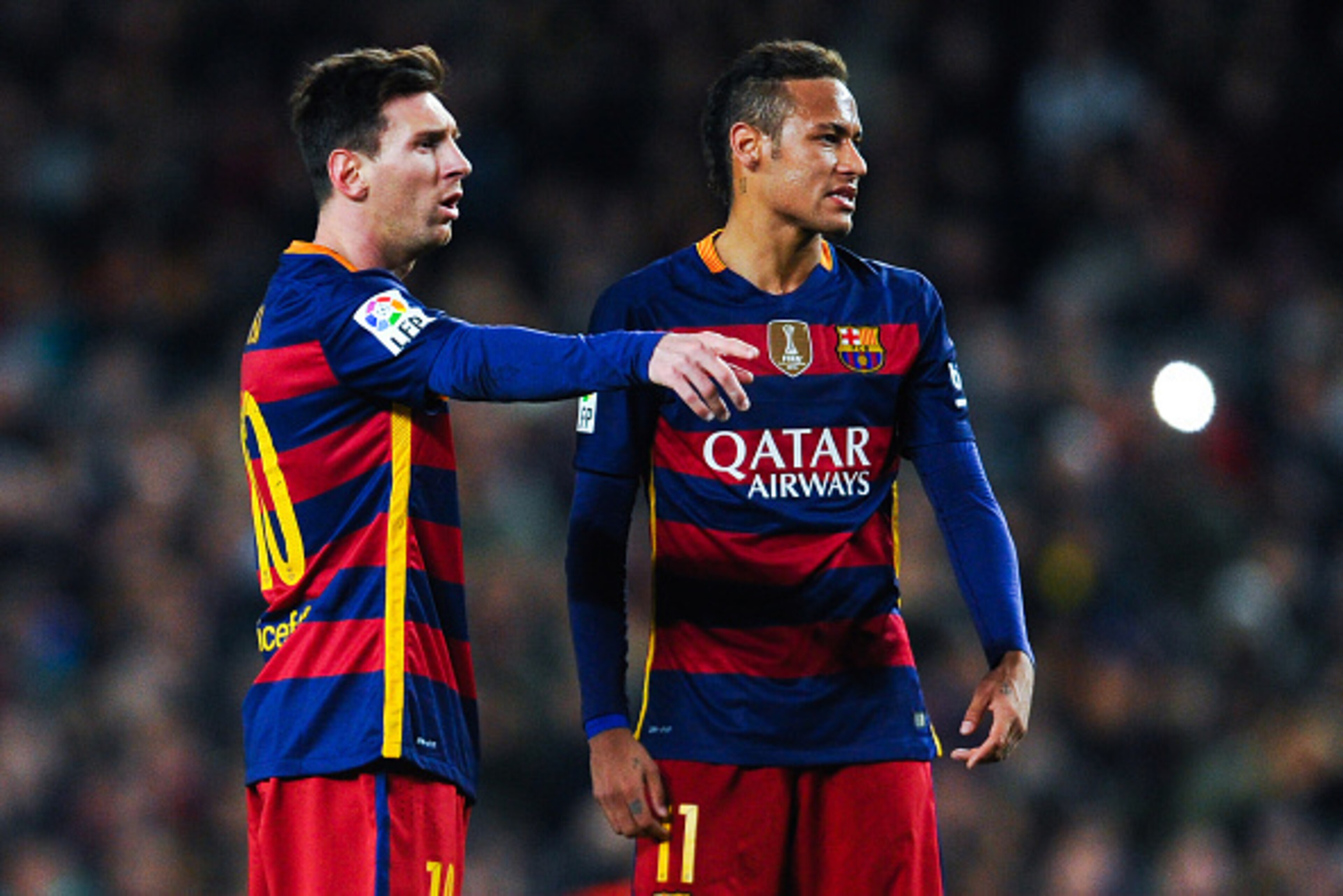 BARCELONA, SPAIN - JANUARY 17:  Lionel Mess and Neymar of FC Barcelona stand next to the ball before taking a free kick during the La Liga match between FC Barcelona and Athletic Club de Bilbao  at Camp Nou on January 17, 2016 in Barcelona, Spain.  (Photo