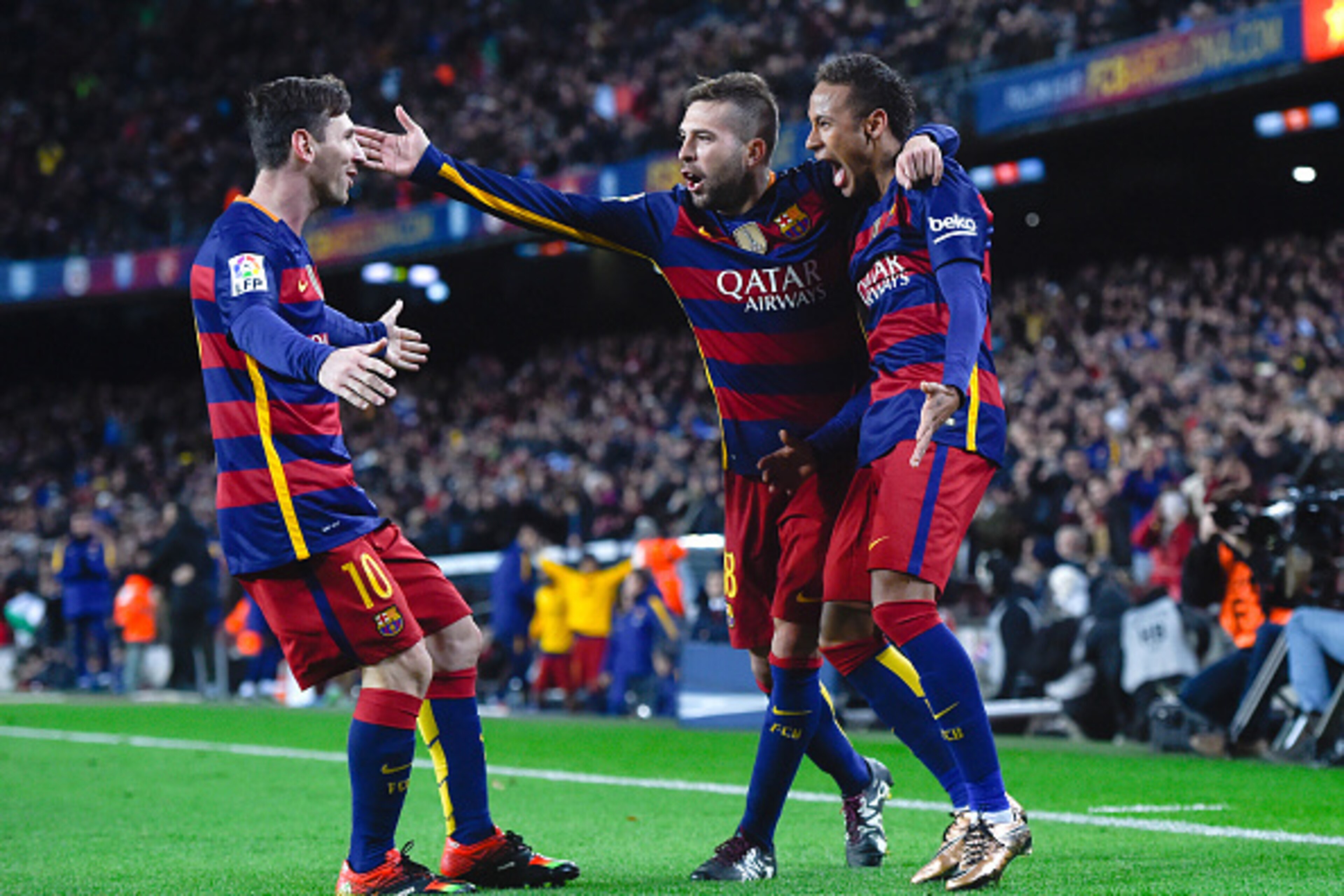 BARCELONA, SPAIN - JANUARY 06:  Neymar (R) of FC Barcelona celebrates with his teammates Lionel Messi (L) and Jordi Alba of FC Barcelona after scoring his team's fourth goal during the Copa del Rey Round of 16 first leg match between FC Barcelona and RCD 