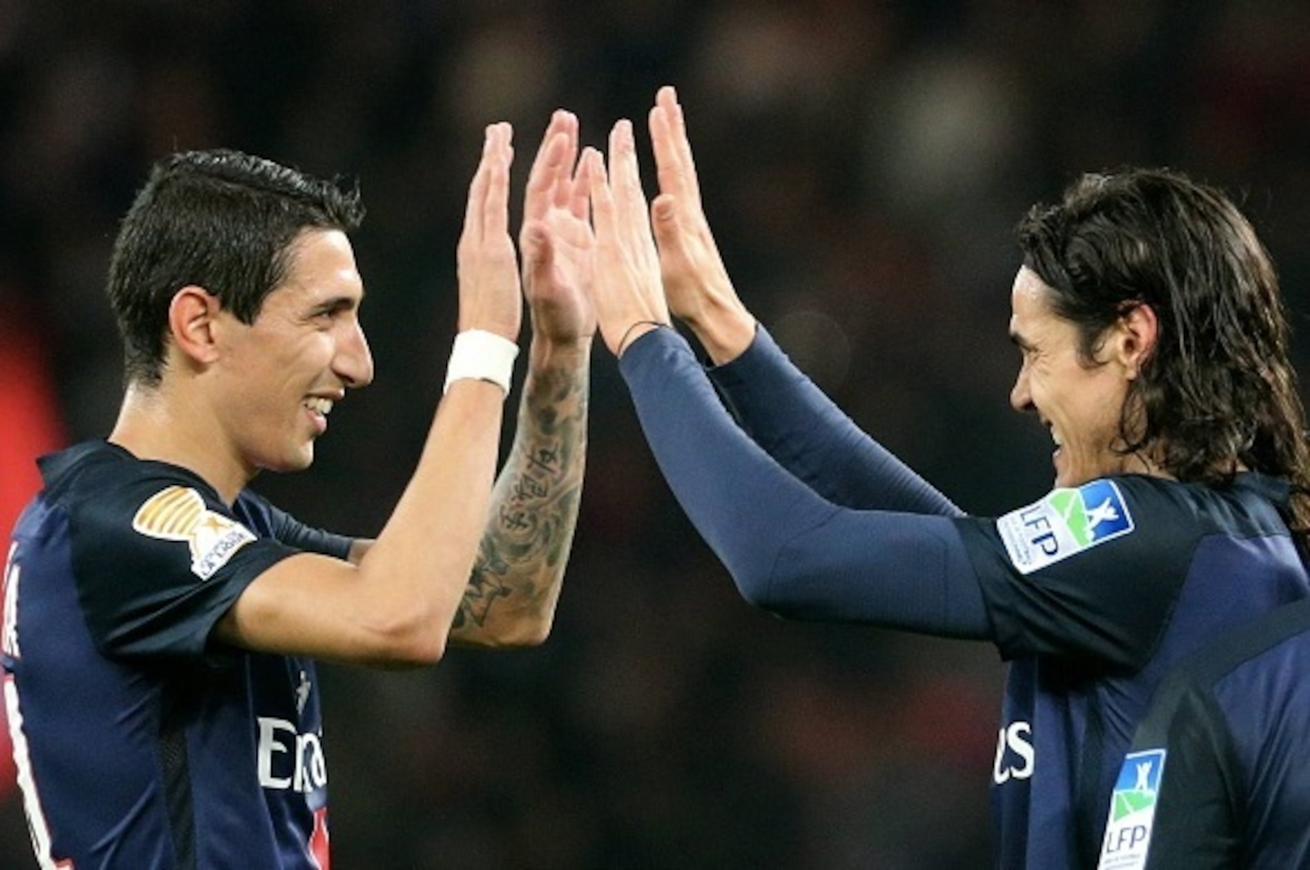 PARIS, FRANCE - DECEMBER 16:  Edinson Cavani of Paris Saint-Germain celebrate his goal with Angel Di Maria (L) during the French  League Cup between Paris Saint-Germain and AS Saint Etienne at Parc Des Princes on december 16, 2015 in Paris, France.  (Phot