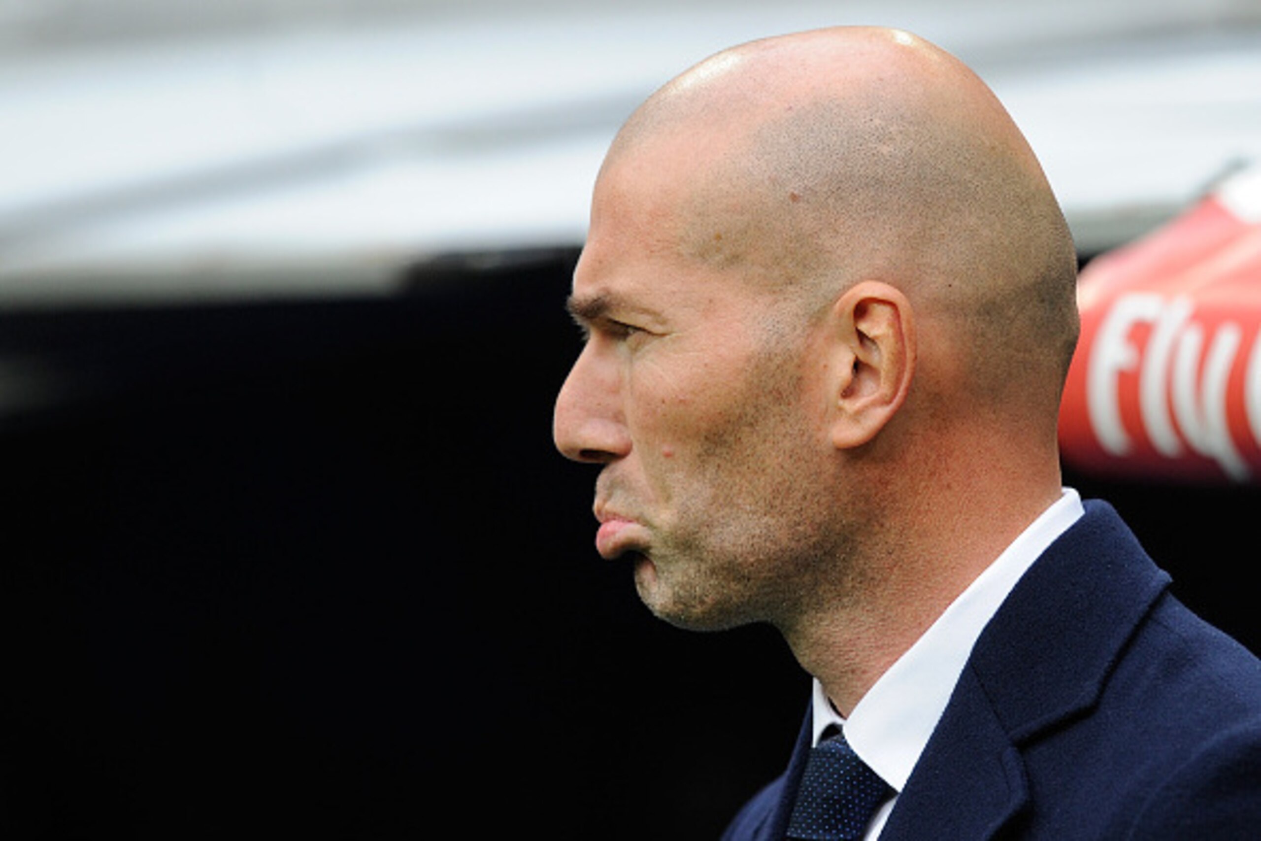 MADRID, SPAIN - JANUARY 17:  Zinedine Zidane manager of Real Madrid looks on prior to the start of the La Liga match between Real Madrid CF and Sporting Gijon at Estadio Santiago Bernabeu on January 17, 2016 in Madrid, Spain.  (Photo by Denis Doyle/Getty 