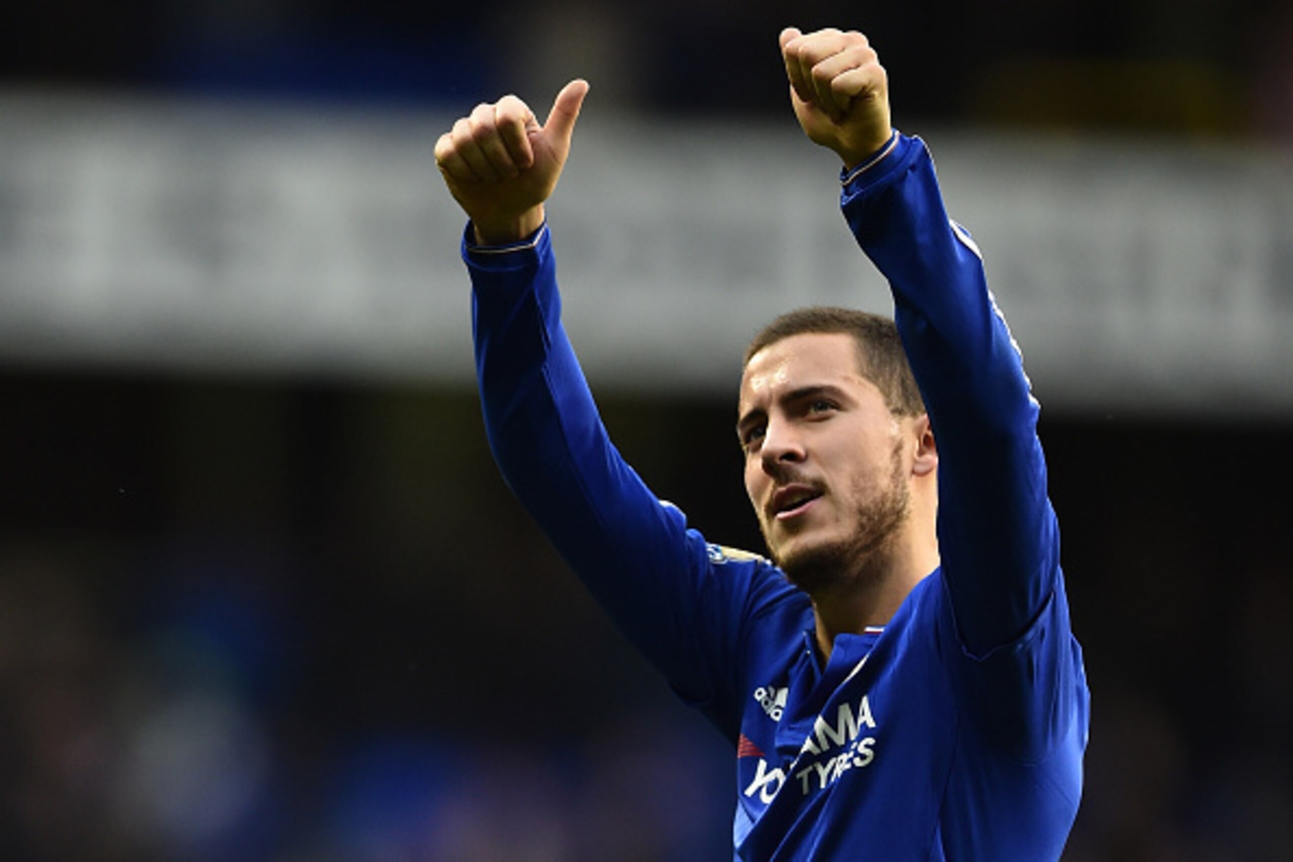 Chelsea's Belgian midfielder Eden Hazard gives a thumbs up to fans after the English Premier League football match between Tottenham Hotspur and Chelsea at White Hart Lane in north London on November 29, 2015.     / AFP / BEN STANSALL        (Photo credit