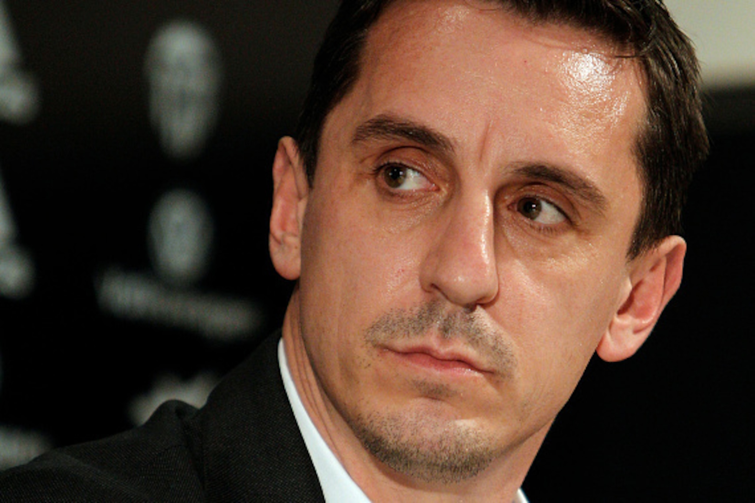 England football coach Gary Neville sits during his official presentation as Valencia's new coach at the Mestalla stadium in Valencia on December 3, 2015. Neville's appointment as Valencia boss for the remainder of the season was received with shock in Sp