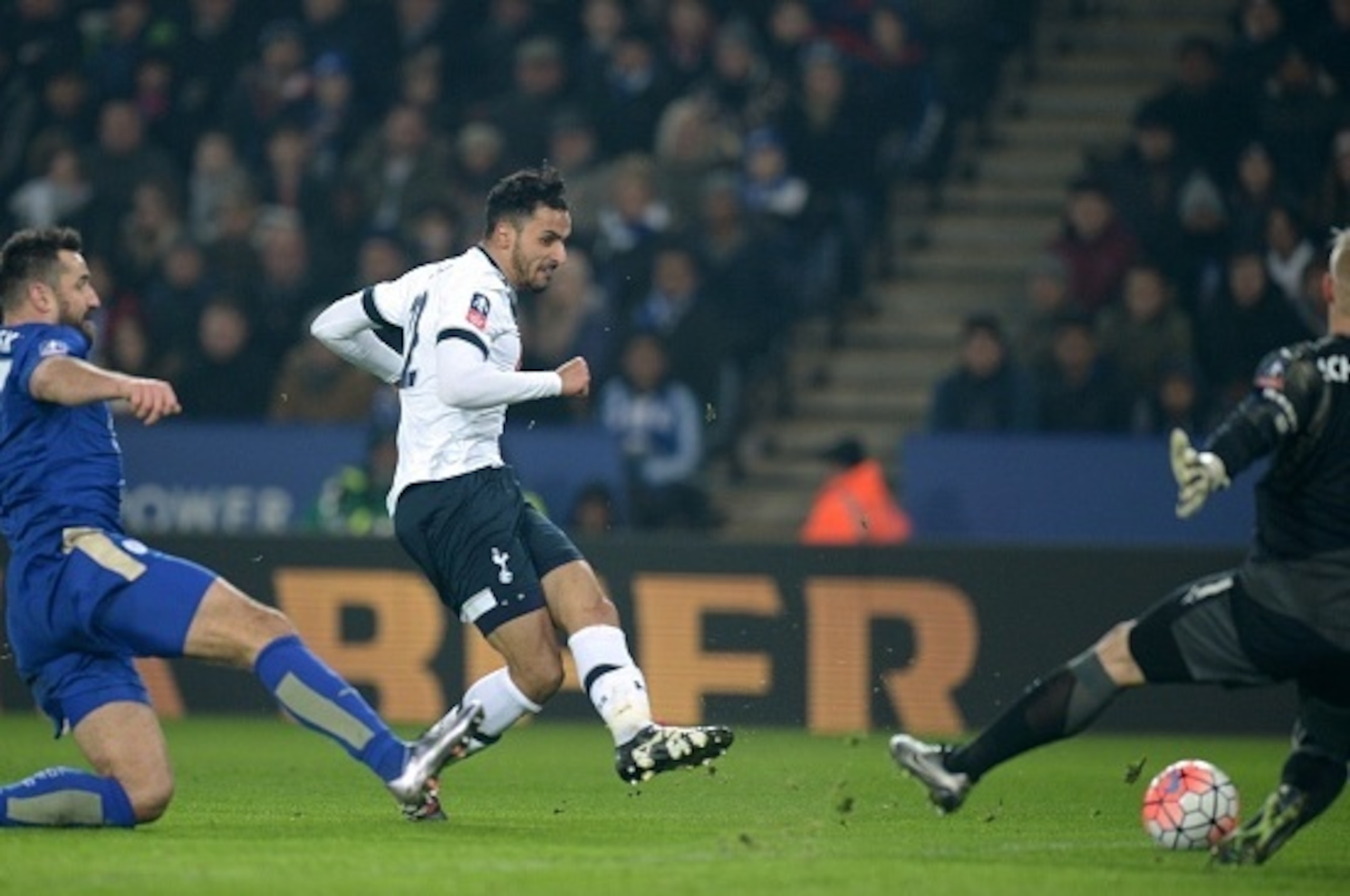 Tottenham Hotspur's Belgian midfielder Nacer Chadli (C) shoots to score their second goal during the English FA Cup third round replay football match between Leicester City v Tottenham Hotspur at King Power Stadium in Leicester, central England on January