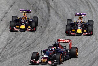 KUALA LUMPUR, MALAYSIA - MARCH 29:  Daniel Ricciardo of Australia and Infiniti Red Bull Racing and Daniil Kvyat of Russia and Infiniti Red Bull Racing drive next to Max Verstappen of Netherlands and Scuderia Toro Rosso during the Malaysia Formula One Gran