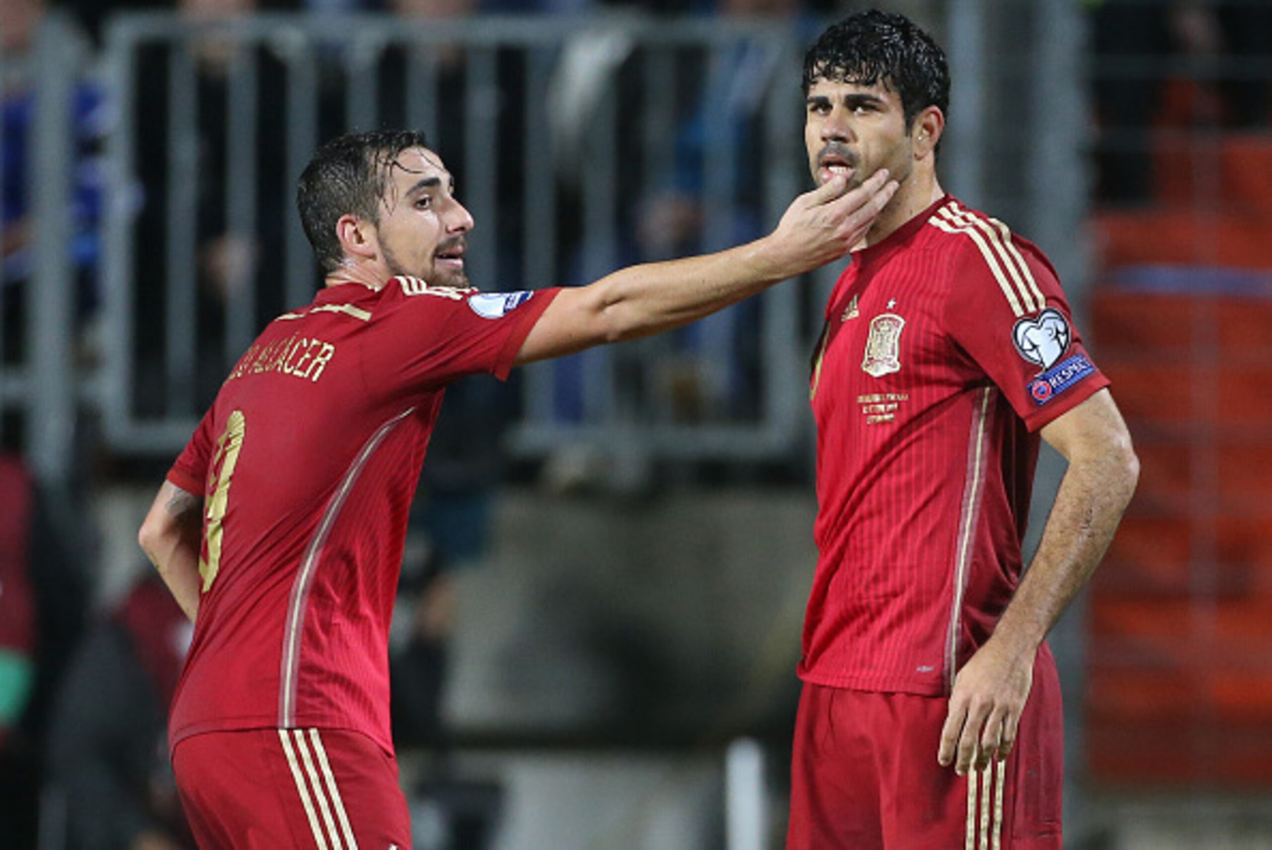LUXEMBOURG, LUXEMBOURG - OCTOBER 12: Diego Costa of Spain is consoled by Paco Alcacer of Spain after missing a goal during the Euro 2016 qualifier match between Luxembourg and Spain at Stade Josy Barthel stadium on October 12, 2014 in Luxembourg. (Photo b