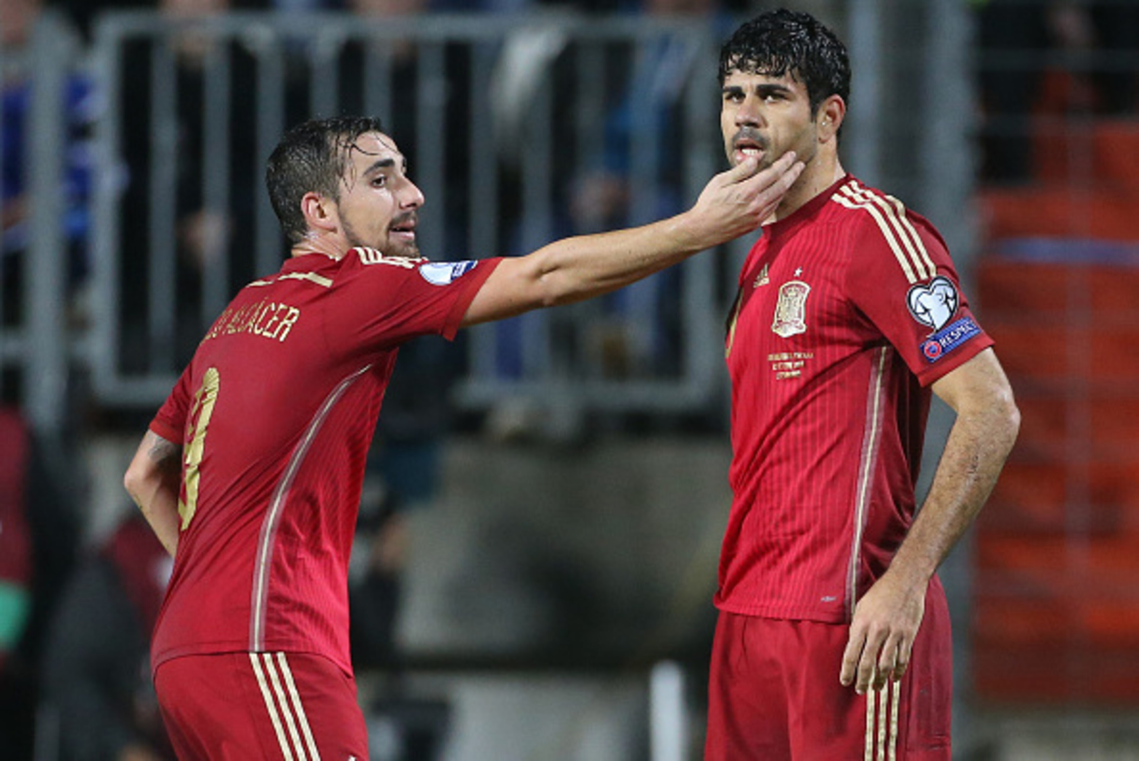 LUXEMBOURG, LUXEMBOURG - OCTOBER 12: Diego Costa of Spain is consoled by Paco Alcacer of Spain after missing a goal during the Euro 2016 qualifier match between Luxembourg and Spain at Stade Josy Barthel stadium on October 12, 2014 in Luxembourg. (Photo b