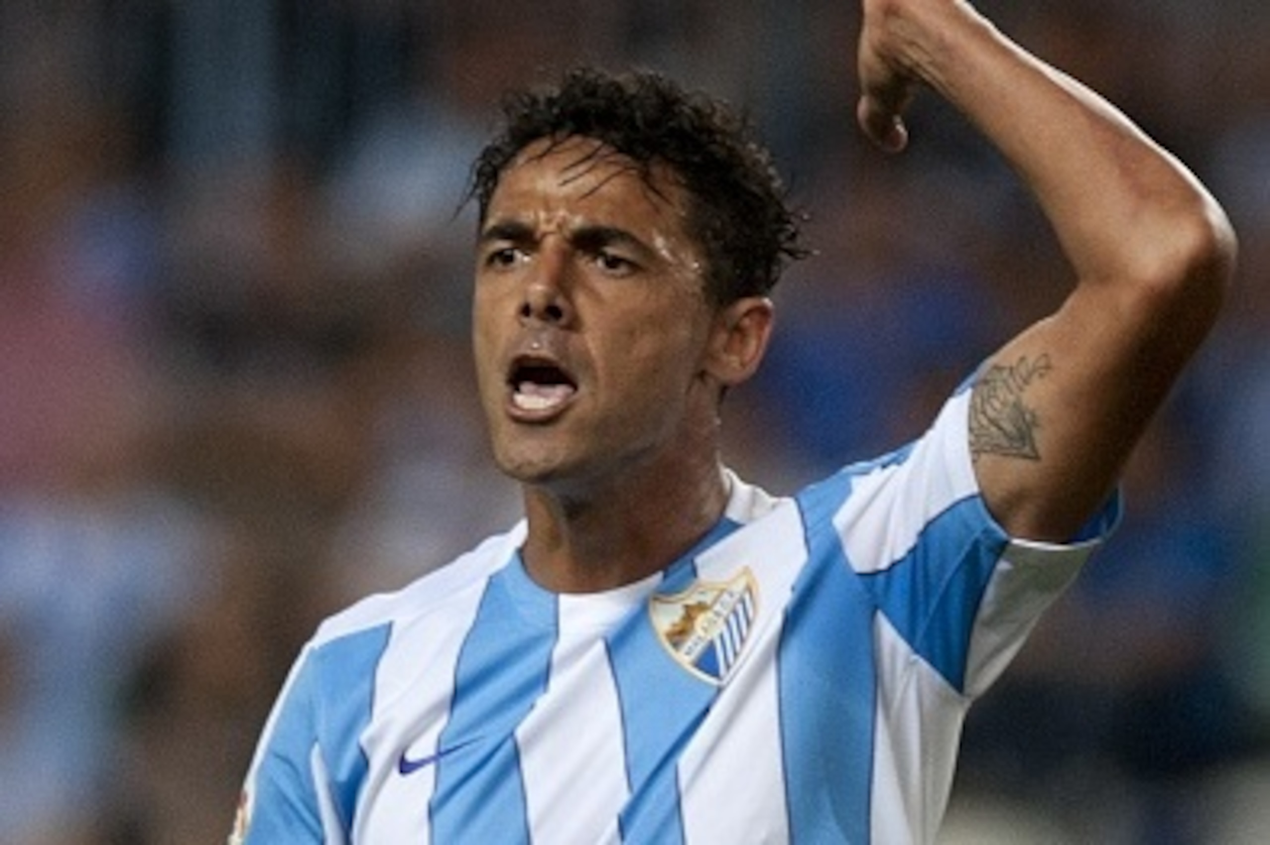 Malaga's Brazilian defender Weligton gestures during the Spanish league football match Malaga CF vs Villarreal CF at La Rosaleda stadium in Malaga on September 23, 2015.   AFP PHOTO / JORGE GUERRERO        (Photo credit should read Jorge Guerrero/AFP/Gett