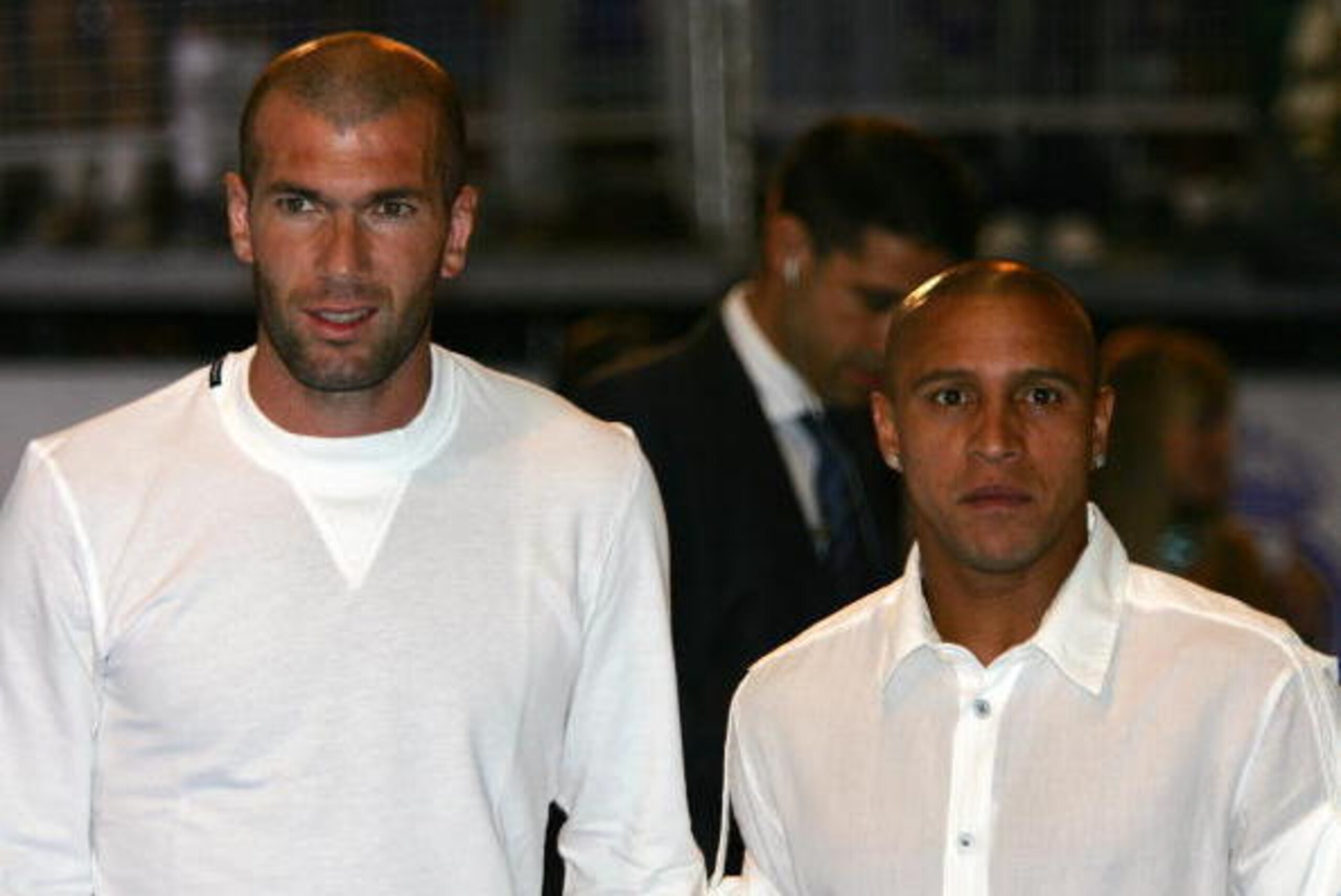 MADRID, Spain:  Real Madrid's Zindedine Zidane (L) and Roberto Carlos arrive for the premiere of 'Real, The Film' at the Santiago Bernabeu stadium in Madrid, 24 August 2005. The film which will be out in Spain 26 August is a mixture of fiction and reality