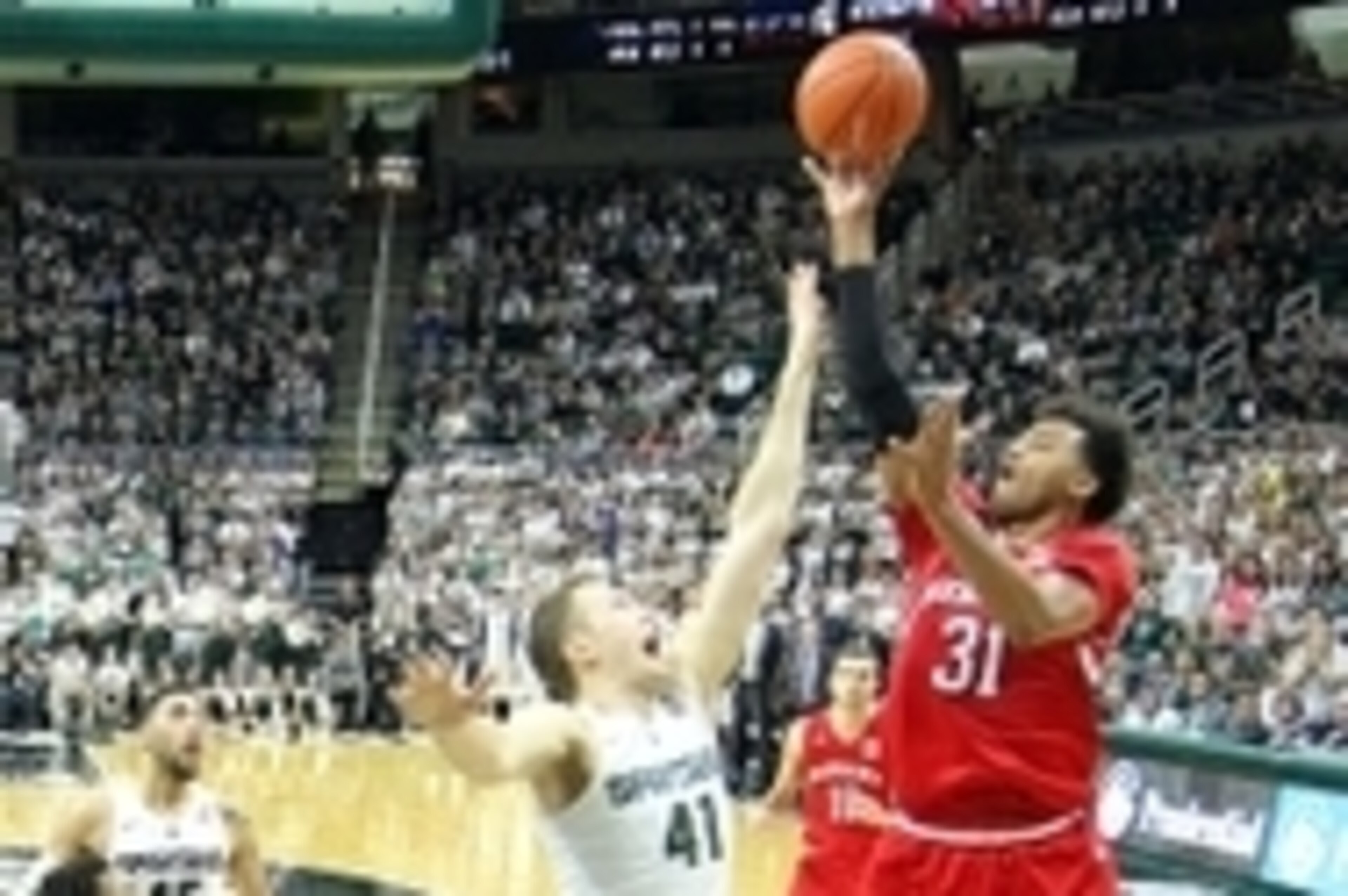 Jan 20, 2016; East Lansing, MI, USA; Nebraska Cornhuskers forward Shavon Shields (31) shoots over Michigan State Spartans forward Colby Wollenman (41) during the second half of a game at Jack Breslin Student Events Center. Mandatory Credit: Mike Carter-US Jan 20, 2016; East Lansing, MI, USA; Nebraska Cornhuskers forward Shavon Shields (31) shoots over Michigan State Spartans forward Colby Wollenman (41) during the second half of a game at Jack Breslin Student Events Center. Mandatory Credit: Mike Carter-US