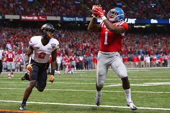 NEW ORLEANS, LA - JANUARY 01:  Laquon Treadwell #1 of the Mississippi Rebels scores a touchdown against the Oklahoma State Cowboys during the fourth quarter of the Allstate Sugar Bowl at Mercedes-Benz Superdome on January 1, 2016 in New Orleans, Louisiana