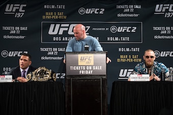 LAS VEGAS, NV - JANUARY 20:  (R-L) UFC featherweight champion Conor McGregor and UFC lightweight champion Rafael dos Anjos speaks to the media during the UFC 197 on-sale press conference event inside MGM Grand Hotel & Casino on January 20, 2016 in Las Veg