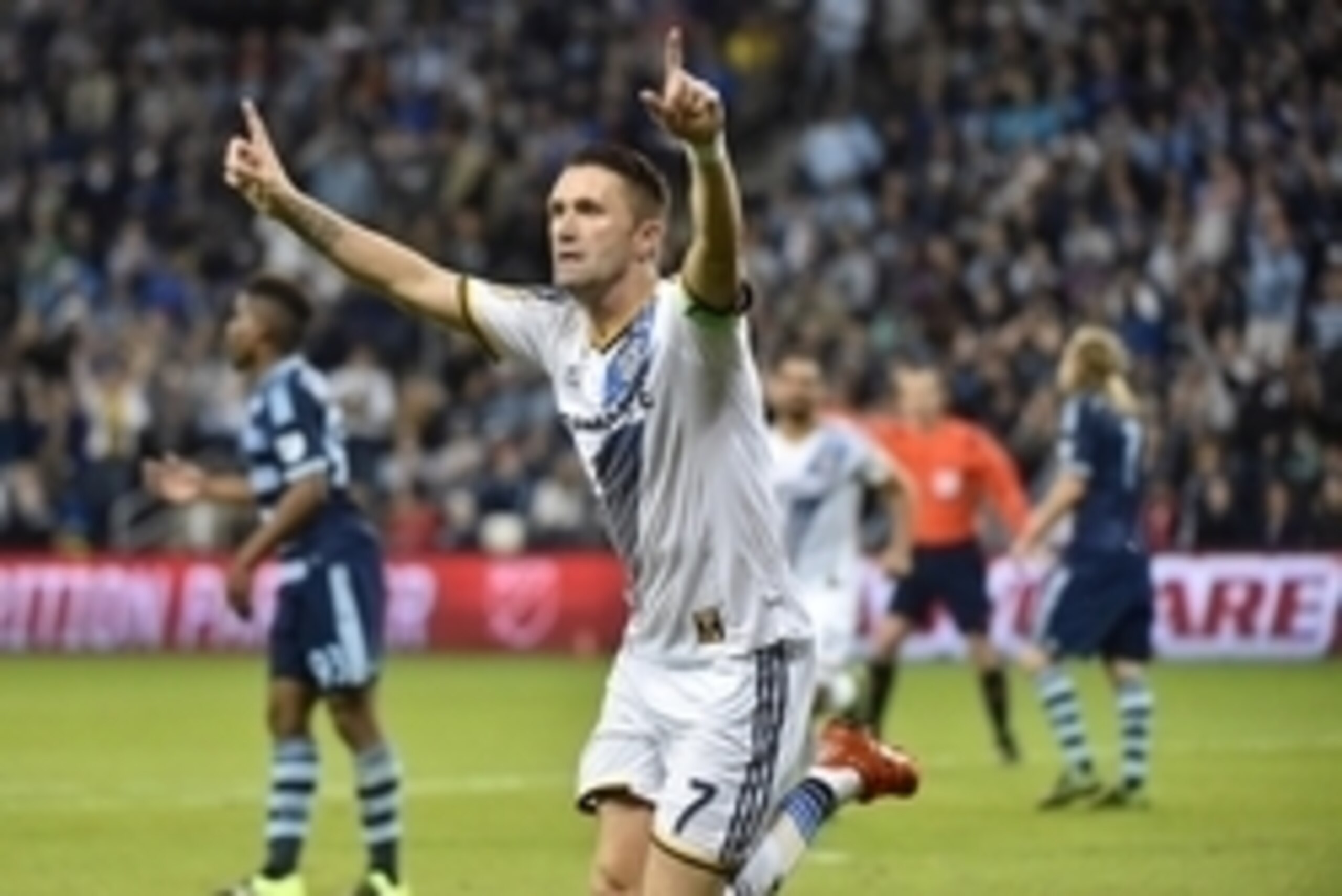 Oct 25, 2015; Kansas City, KS, USA; LA Galaxy forward Robbie Keane (7) reacts after scoring a goal against Sporting KC during the first half at Sporting Park. Mandatory Credit: Peter G. Aiken-USA TODAY Sports