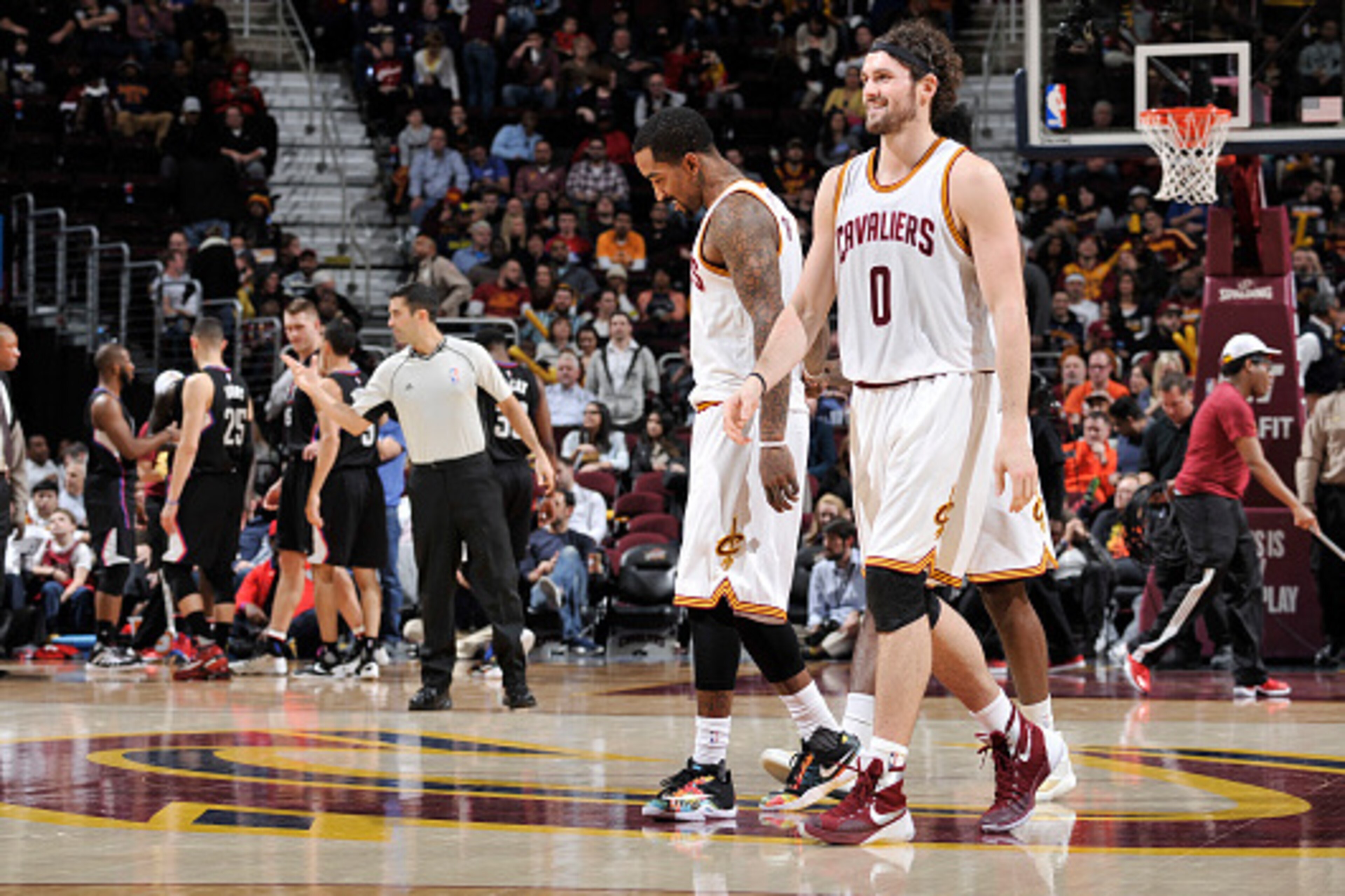 CLEVELAND, OH - JANUARY 21:  Kevin Love #0 of the Cleveland Cavaliers and J.R. Smith #5 of the Cleveland Cavaliers celebrate during the game against the Los Angeles Clippers on January 21, 2016 at Quicken Loans Arena in Cleveland, Ohio. NOTE TO USER: User