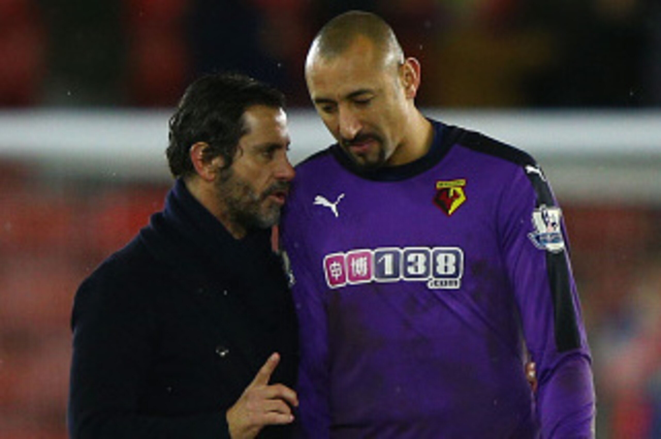 SOUTHAMPTON, ENGLAND - JANUARY 13:  Quique Flores (L) manager of Watford talks with Heurelho Gomes (R) after the Barclays Premier League match between Southampton and Watford at St. Mary's Stadium on January 13, 2016 in Southampton, England.  (Photo by Ia