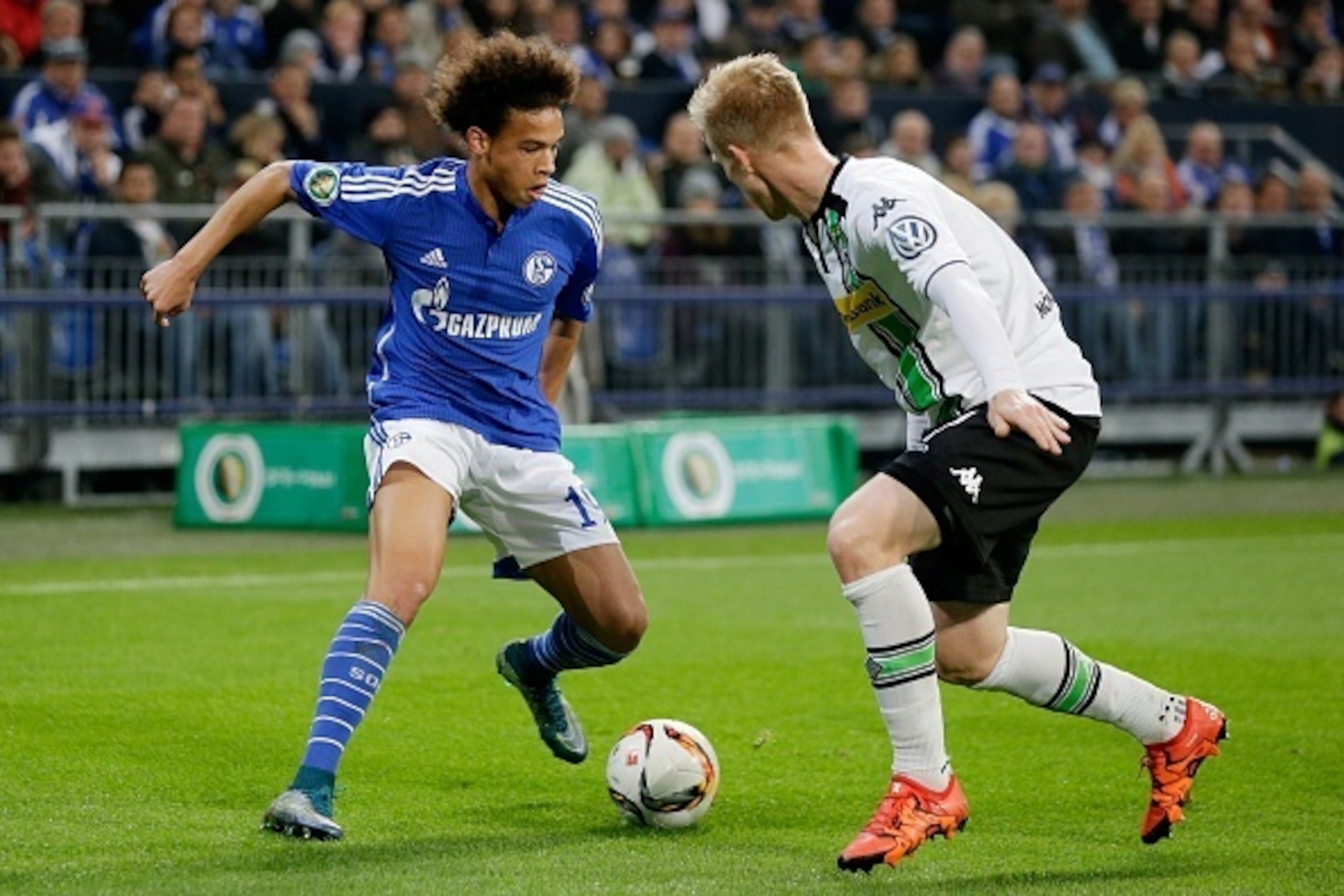 (L-R) Leroy Sane of Schalke 04, Oscar Wendt of Borussia Monchengladbach during the DFB Pokal match between Schalke 04 and Borussia Monchengladbach on October 28, 2015 at the Veltins Arena in Gelsenkirchen, Germany.(Photo by VI Images via Getty Images)