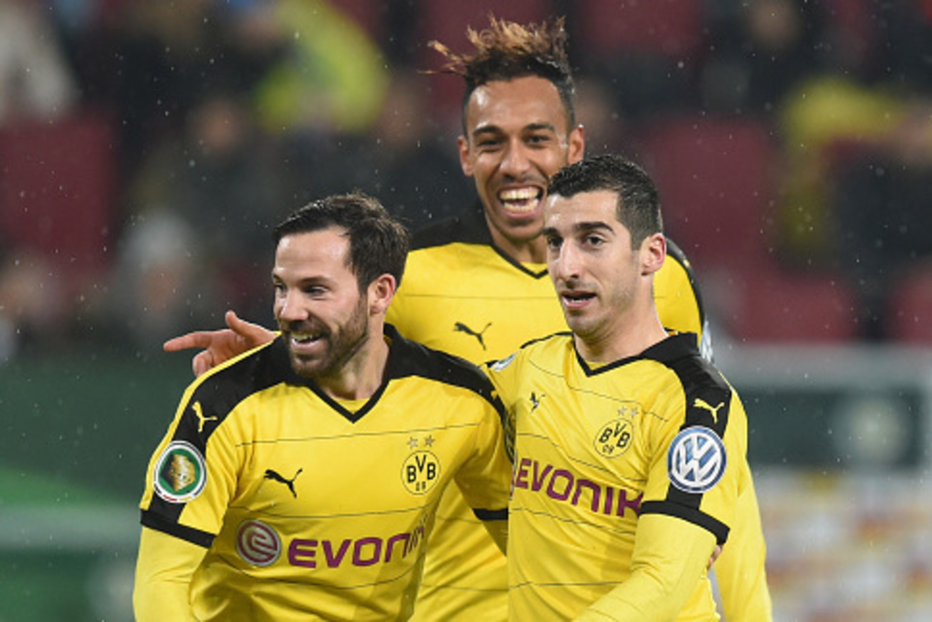 (R-L) Dortmund's Armenian midfielder Henrikh Mkhitaryan, Dortmund's Gabonese striker Pierre-Emerick Aubameyang and Dortmund's midfielder Gonzalo Castro celebrate after a second goal during the German Cup DFB Pokal third round match between Borussia Dortmu