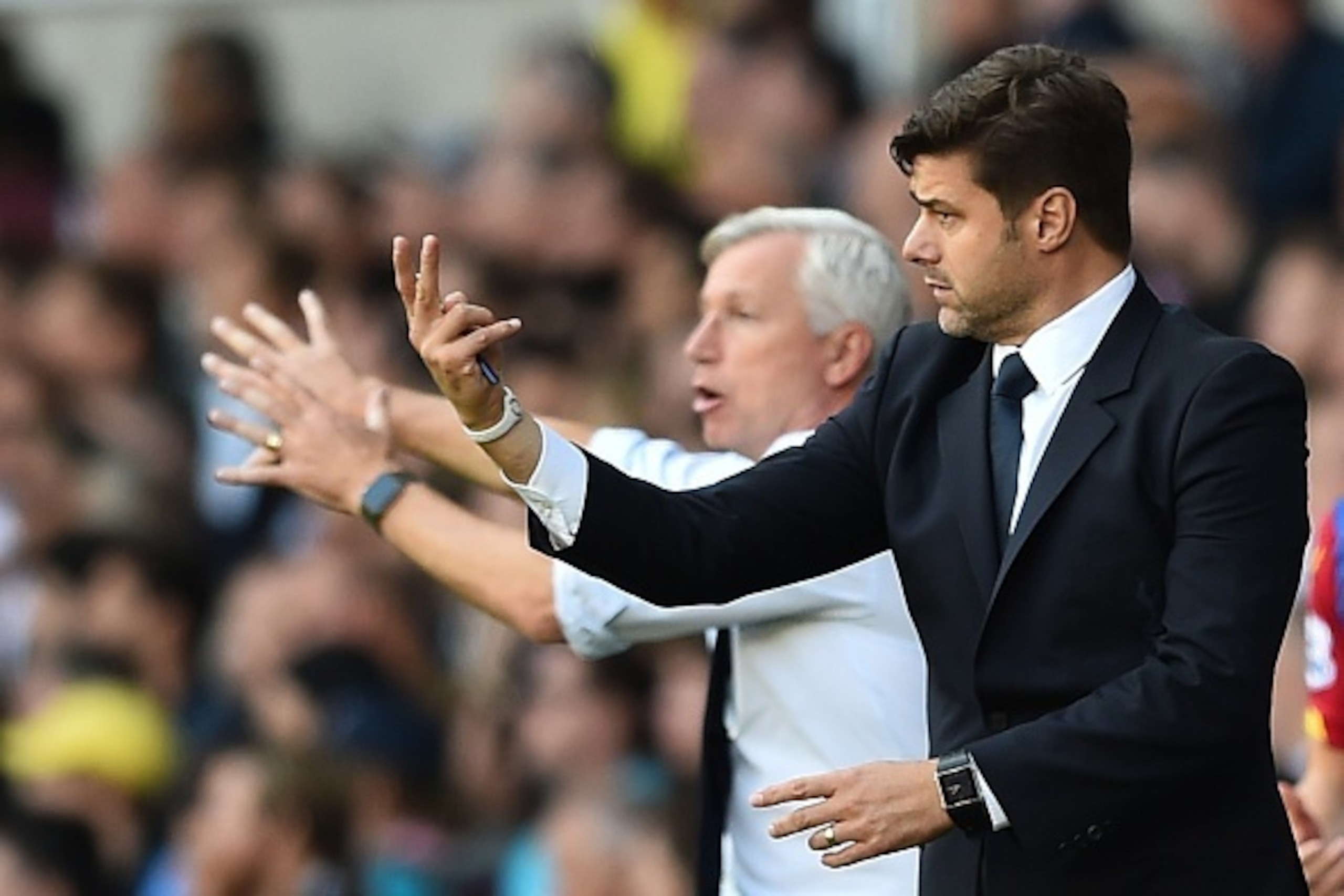 Tottenham Hotspur's Argentinian Head Coach Mauricio Pochettino (L) and Crystal Palace's English manager Alan Pardew gesture during the English Premier League football match between Tottenham Hotspur and Crystal Palace at White Hart Lane in north London on Tottenham Hotspur's Argentinian Head Coach Mauricio Pochettino (L) and Crystal Palace's English manager Alan Pardew gesture during the English Premier League football match between Tottenham Hotspur and Crystal Palace at White Hart Lane in north London on