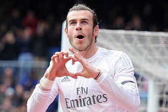 MADRID, SPAIN - JANUARY 17:  Gareth Bale of Real Madrid celebrates after scoring his team's opening goal during the La Liga match between Real Madrid CF and Sporting Gijon at Estadio Santiago Bernabeu on January 17, 2016 in Madrid, Spain.  (Photo by Denis