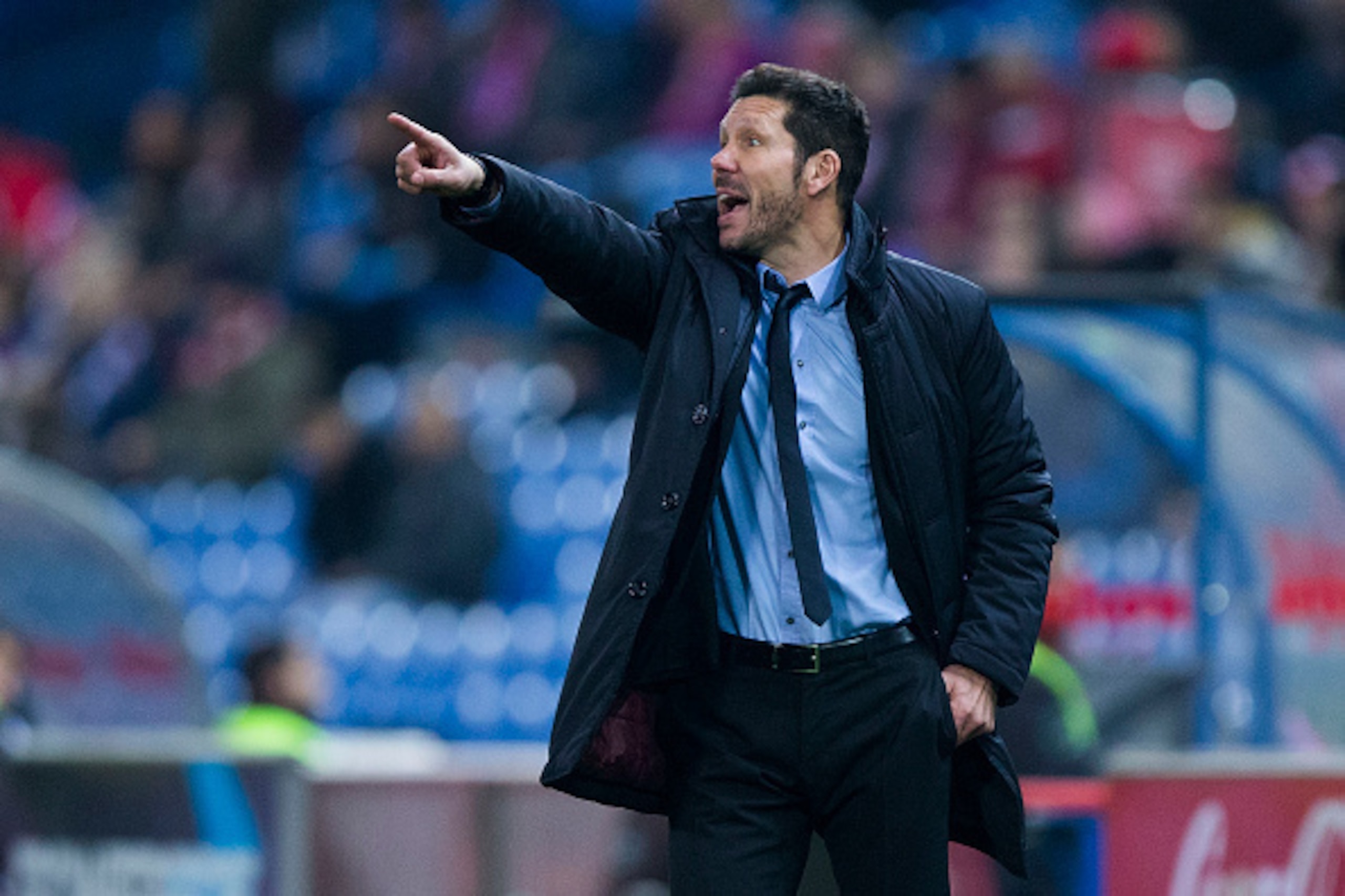 MADRID, SPAIN - JANUARY 14: Head coach Diego Pablo Simeone of Atletico de Madrid gives instructions during the Copa del Rey Round of 16 second leg match between Club Atletico Madrid and Rayo Vallecano de Madrid at Vicente Claderon stadium on January 14, 2