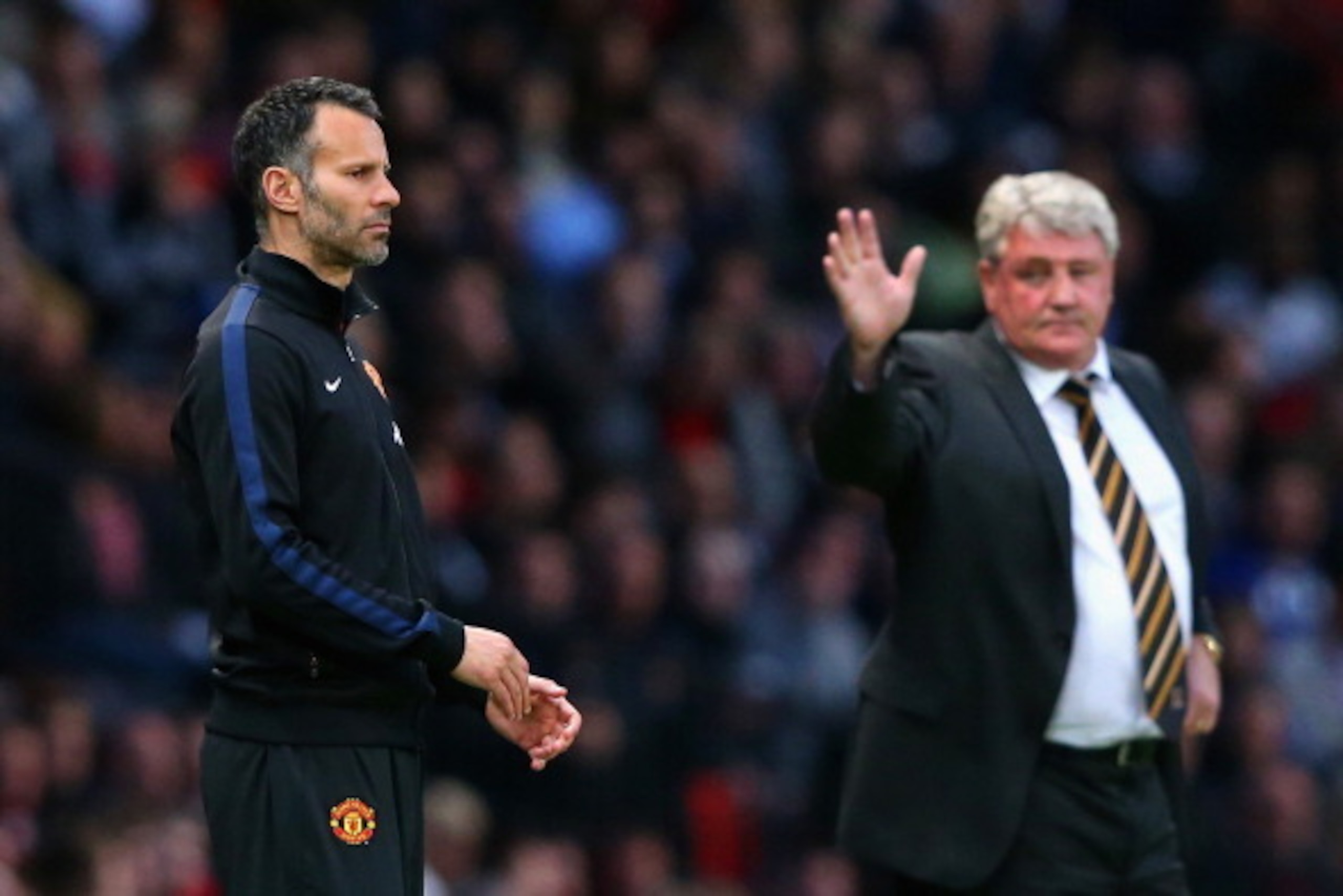 MANCHESTER, ENGLAND - MAY 06: Manchester United Caretaker Manager Ryan Giggs looks on during the Barclays Premier League match between Manchester United and Hull City at Old Trafford on May 6, 2014 in Manchester, England. (Photo by Alex Livesey/Getty Im MANCHESTER, ENGLAND - MAY 06: Manchester United Caretaker Manager Ryan Giggs looks on during the Barclays Premier League match between Manchester United and Hull City at Old Trafford on May 6, 2014 in Manchester, England. (Photo by Alex Livesey/Getty Im