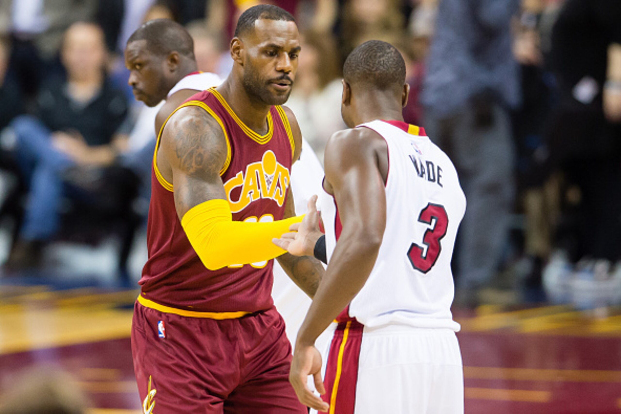 CLEVELAND, OH - OCTOBER 30: LeBron James #23 of the Cleveland Cavaliers and Dwyane Wade #3 of the Miami Heat shake hands during the first half at Quicken Loans Arena on October 30, 2015 in Cleveland, Ohio. NOTE TO USER: User expressly acknowledges and agr