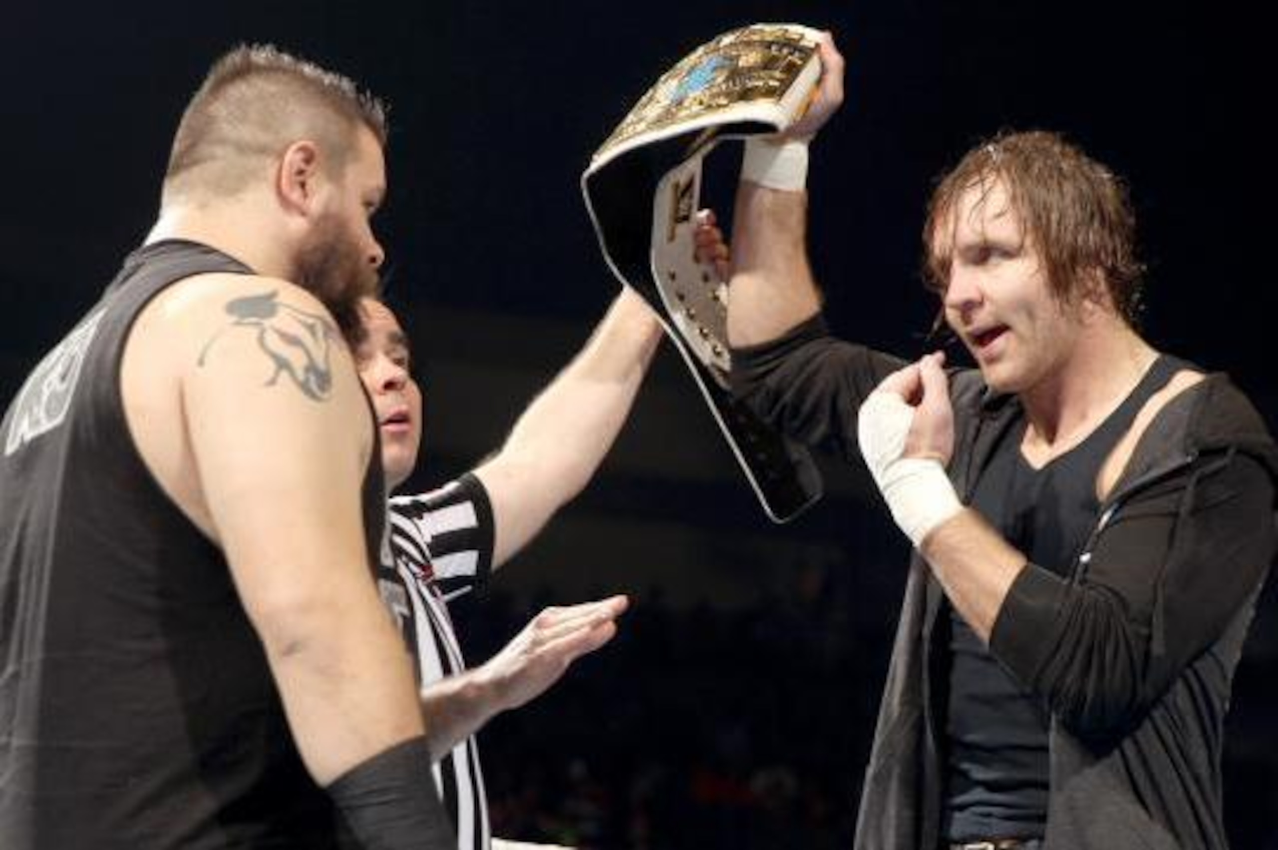 Kevin Owens stares down Dean Ambrose.