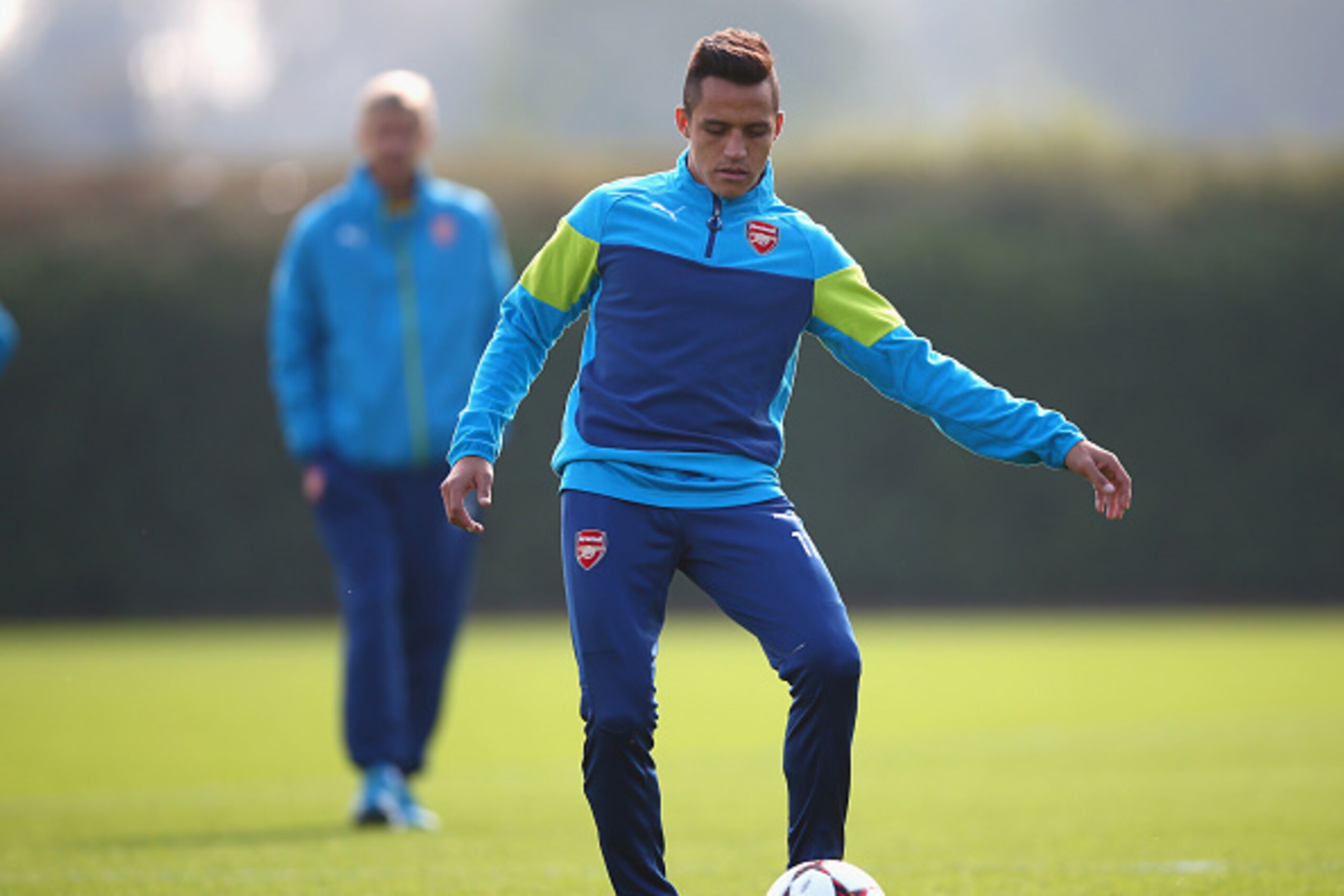 ST ALBANS, ENGLAND - SEPTEMBER 30:  Alexis Sanchez of Arsenal in action during an Arsenal training session ahead of their UEFA Champions League Group D match against Galatasaray at London Colney on September 30, 2014 in St Albans, England.  (Photo by Paul