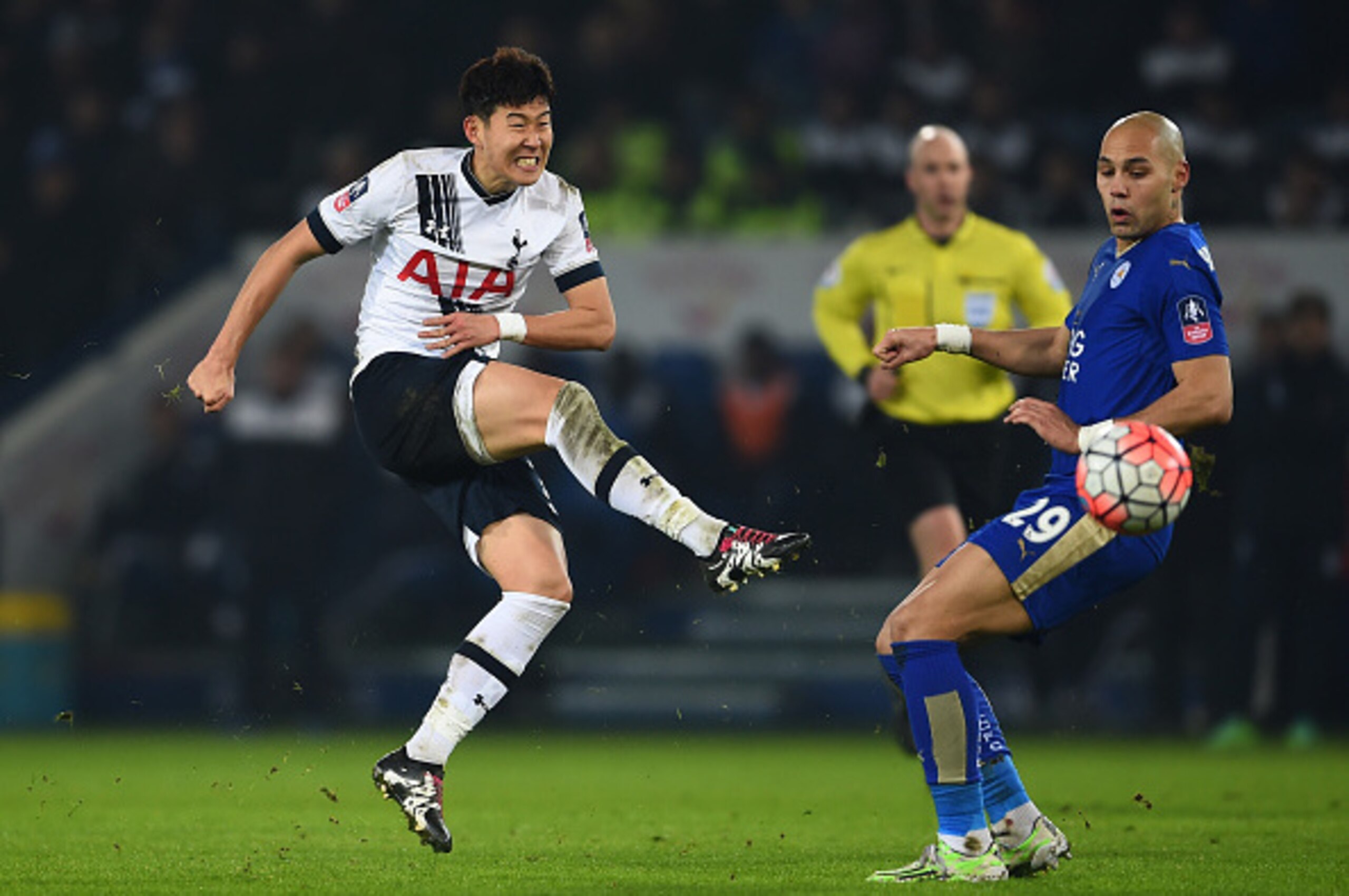 LEICESTER, ENGLAND - JANUARY 20: Son Heung-Min of Spurs takes a shot on goal past Yohan Benalouane of Leicester City during the Emirates FA Cup Third Round Replay match between Leicester City and Tottenham Hotspur at The King Power Stadium on January 20, LEICESTER, ENGLAND - JANUARY 20: Son Heung-Min of Spurs takes a shot on goal past Yohan Benalouane of Leicester City during the Emirates FA Cup Third Round Replay match between Leicester City and Tottenham Hotspur at The King Power Stadium on January 20,