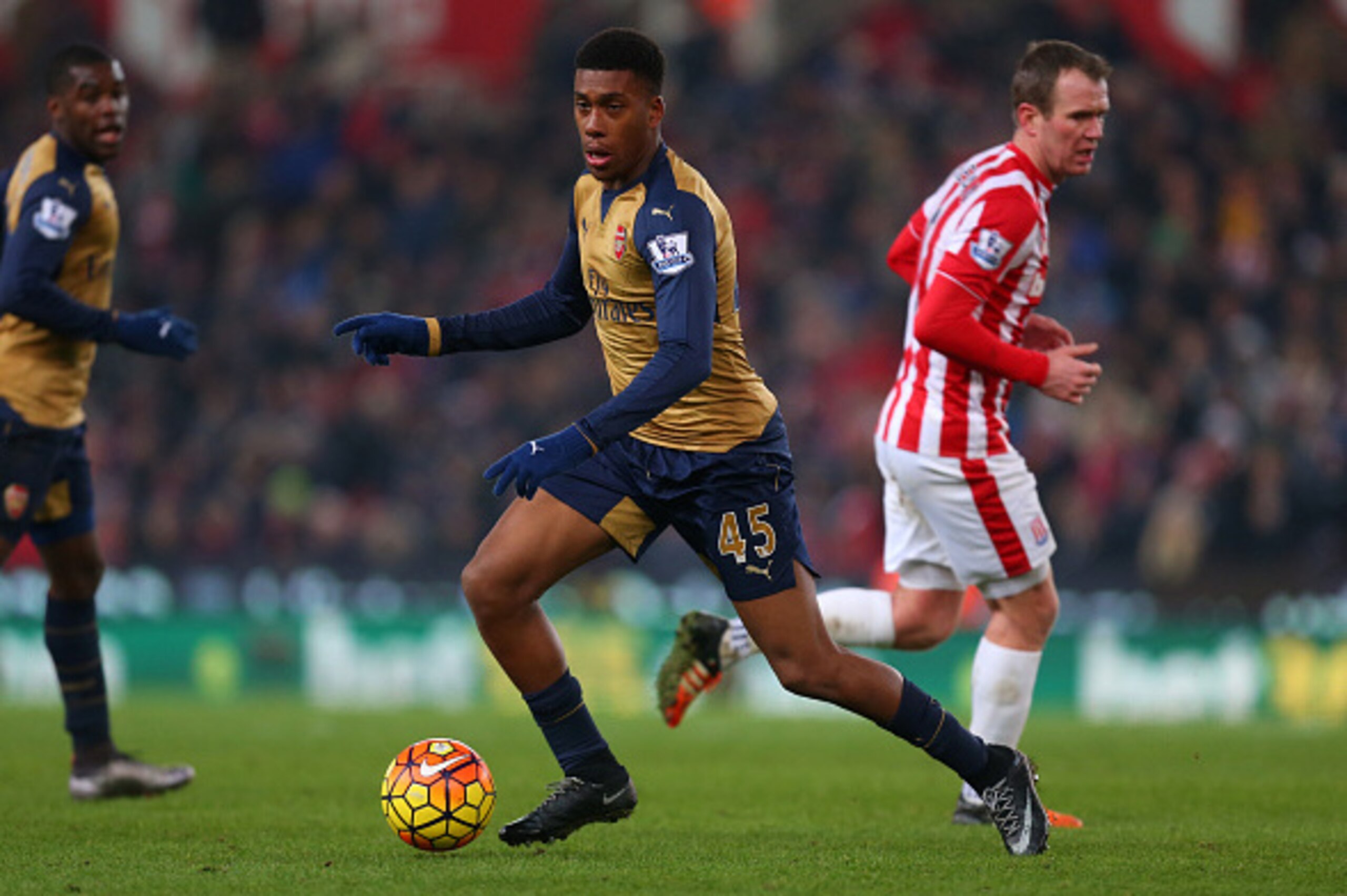 STOKE-ON-TRENT, ENGLAND - JANUARY 17: Alex Iwobi of Arsenal during the Barclays Premier League match between Stoke City and Arsenal at the Britannia Stadium on January 17, 2016 in Stoke-on-Trent, England. (Photo by Catherine Ivill - AMA/Getty Images) STOKE-ON-TRENT, ENGLAND - JANUARY 17: Alex Iwobi of Arsenal during the Barclays Premier League match between Stoke City and Arsenal at the Britannia Stadium on January 17, 2016 in Stoke-on-Trent, England. (Photo by Catherine Ivill - AMA/Getty Images)