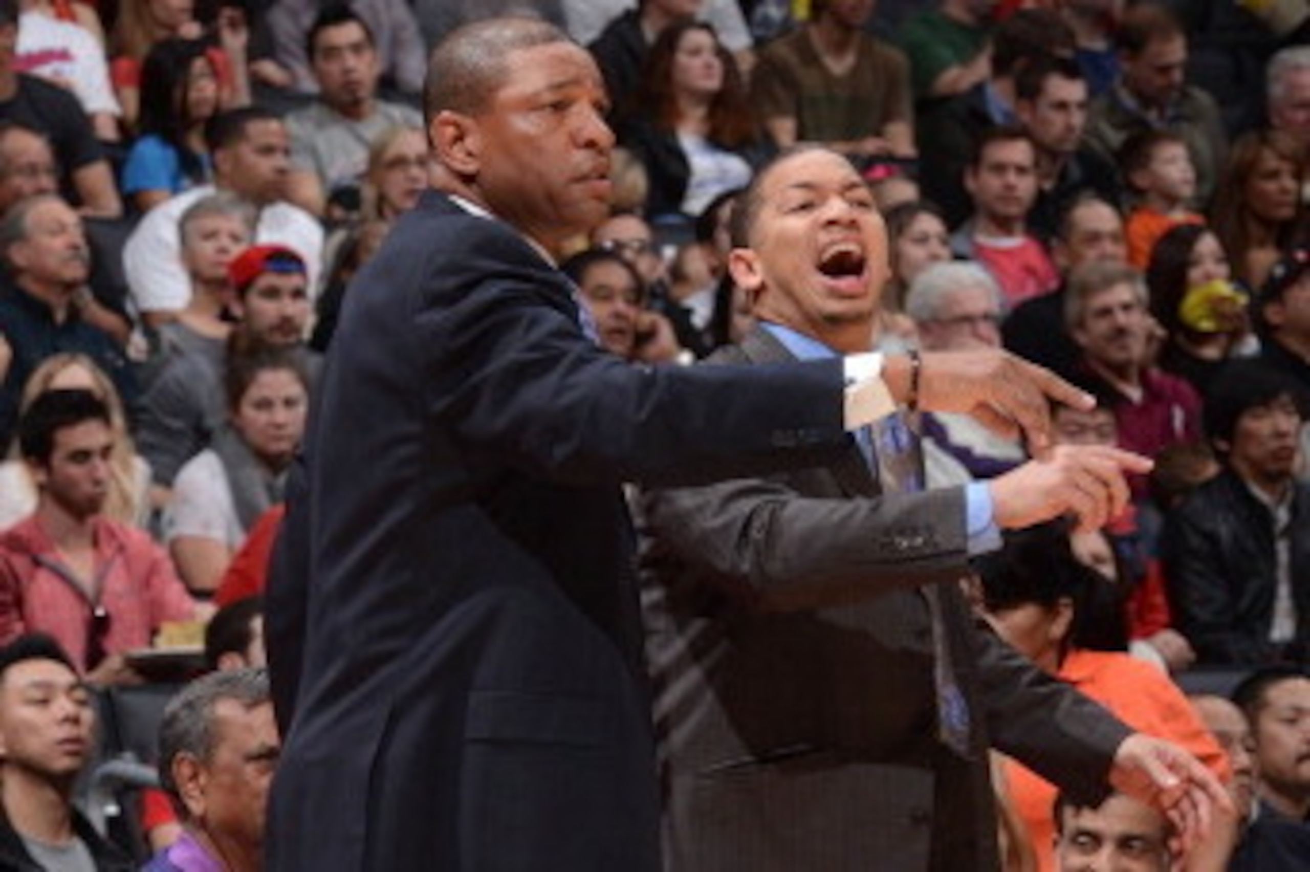 LOS ANGELES, CA - NOVEMBER 23: Doc Rivers of the Los Angeles Clippers and assistant coach Tyronn Lue direct their team against the Sacramento Kings at Staples Center on November 23, 2013 in Los Angeles, California. NOTE TO USER: User expressly acknowledge