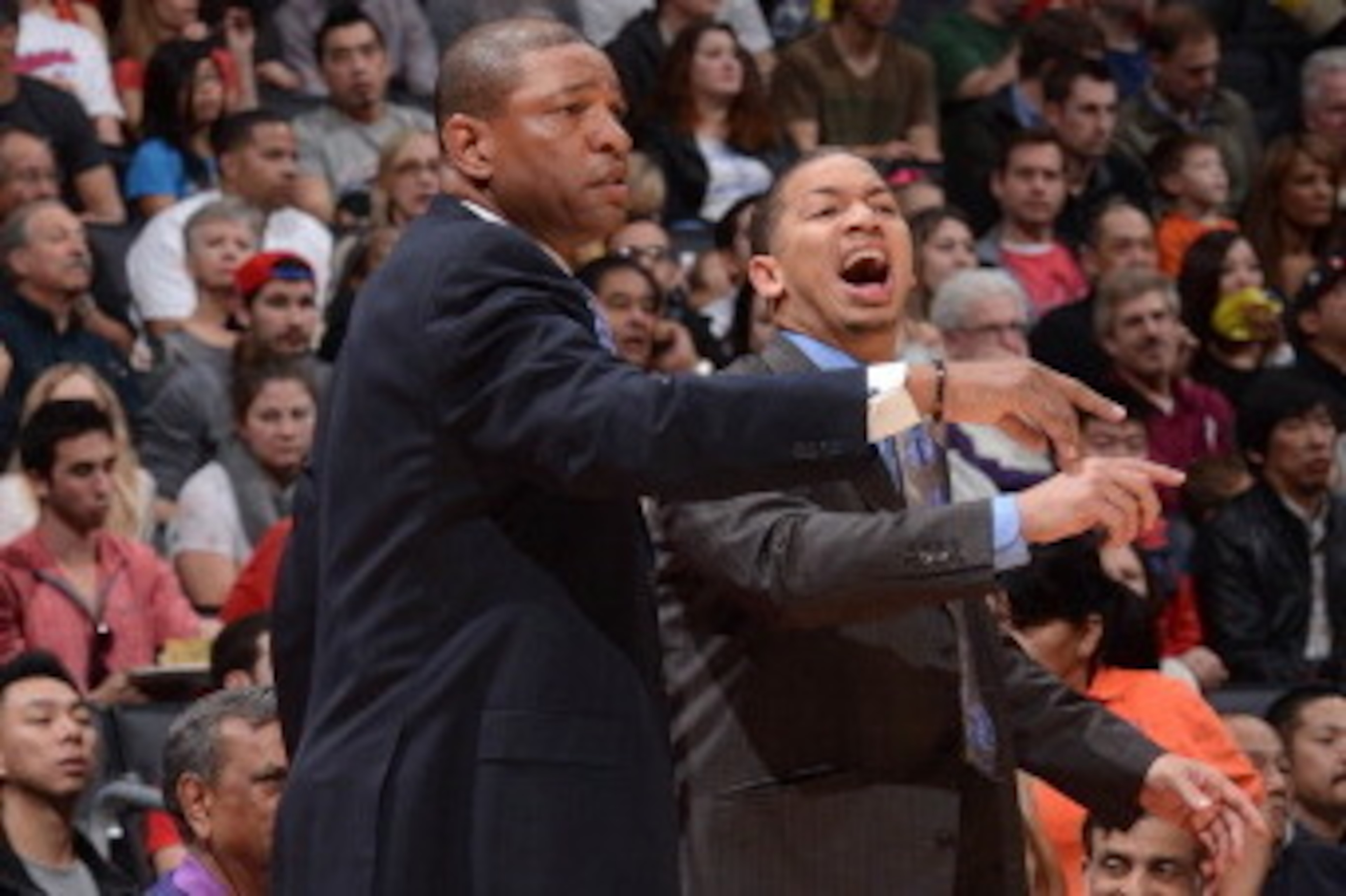 LOS ANGELES, CA - NOVEMBER 23: Doc Rivers of the Los Angeles Clippers and assistant coach Tyronn Lue direct their team against the Sacramento Kings at Staples Center on November 23, 2013 in Los Angeles, California. NOTE TO USER: User expressly acknowledge