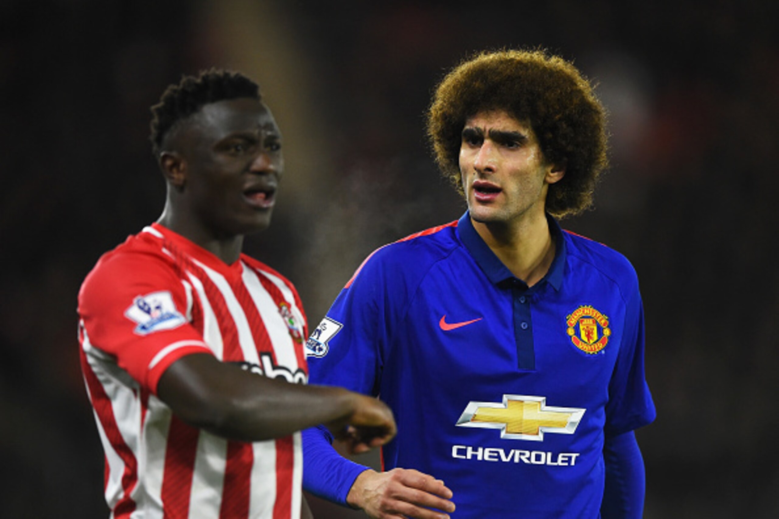 SOUTHAMPTON, ENGLAND - DECEMBER 08: Marouane Fellaini of Manchester United exchanges words with Victor Wanyama of Southampton during the Barclays Premier League match between Southampton and Manchester United at St Mary's Stadium on December 8, 2014 in So SOUTHAMPTON, ENGLAND - DECEMBER 08: Marouane Fellaini of Manchester United exchanges words with Victor Wanyama of Southampton during the Barclays Premier League match between Southampton and Manchester United at St Mary's Stadium on December 8, 2014 in So