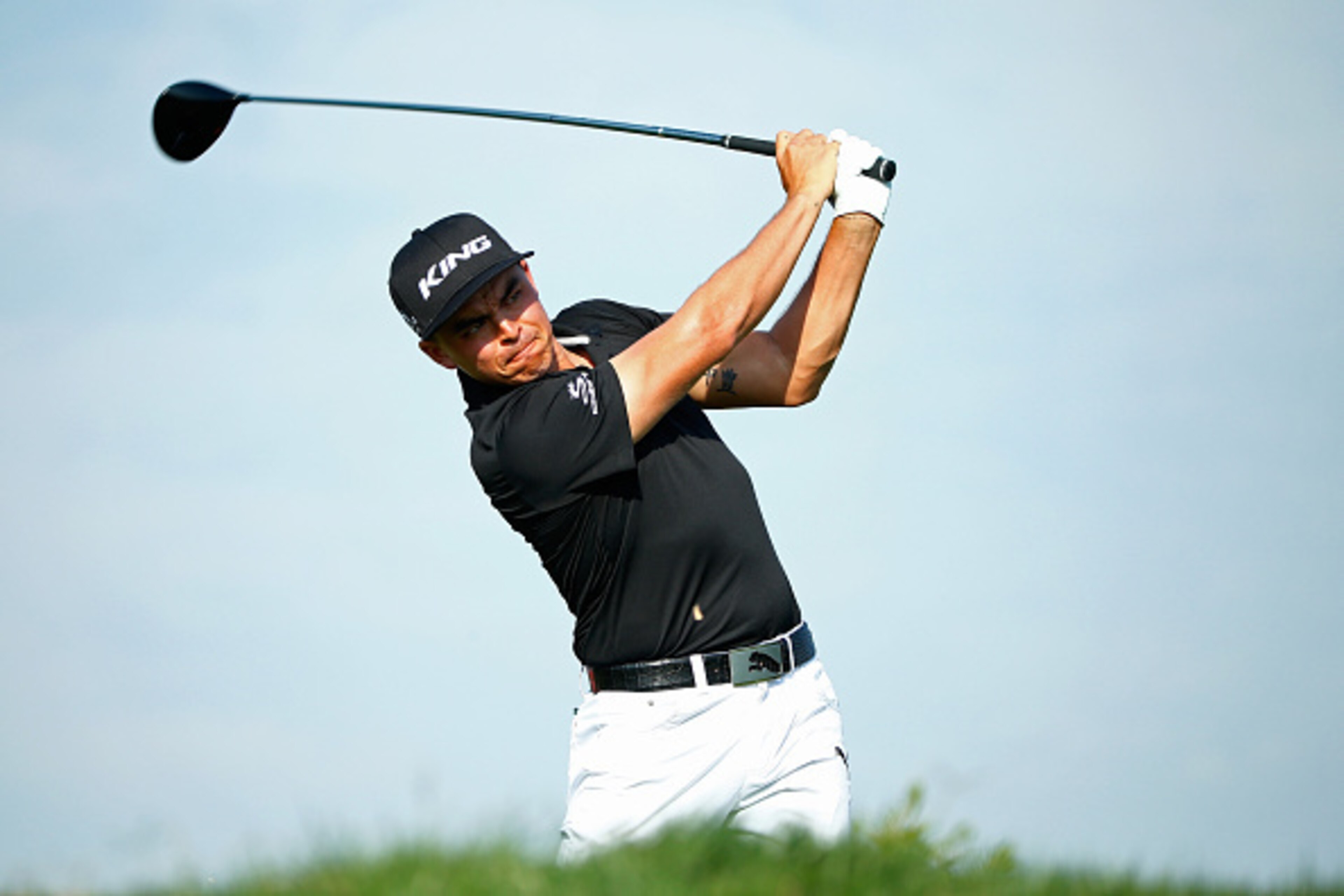 ABU DHABI, UNITED ARAB EMIRATES - JANUARY 23: Rickie Fowler of the United States hits his tee shot on the 3rd hole during the third round of the Abu Dhabi HSBC Golf Championship at the Abu Dhabi Golf Club on January 23, 2016 in Abu Dhabi, United Arab Emir ABU DHABI, UNITED ARAB EMIRATES - JANUARY 23: Rickie Fowler of the United States hits his tee shot on the 3rd hole during the third round of the Abu Dhabi HSBC Golf Championship at the Abu Dhabi Golf Club on January 23, 2016 in Abu Dhabi, United Arab Emir