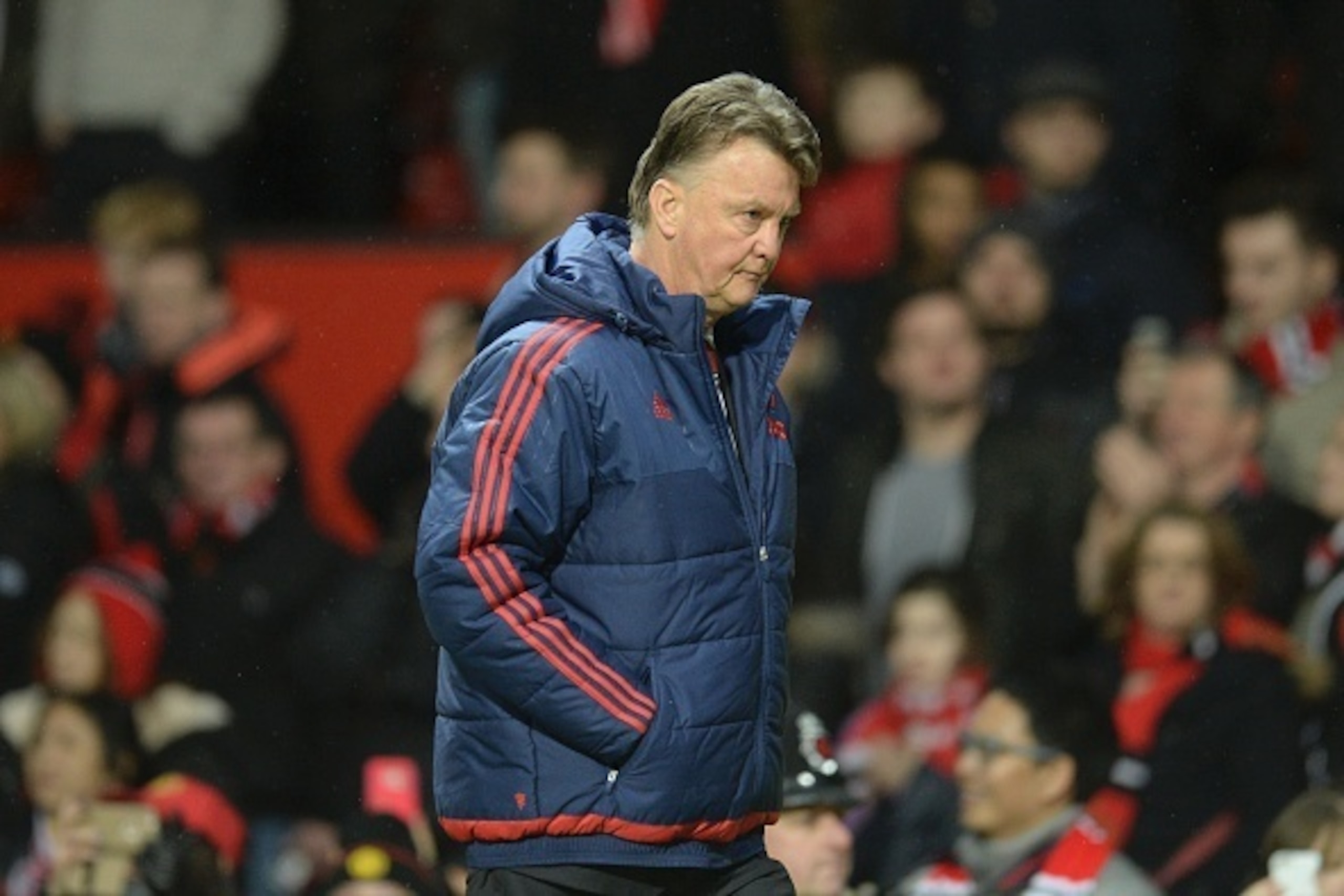 Manchester United's Dutch manager Louis van Gaal leaves the pitch at full-time during the English Premier League football match between Manchester United and Southampton at Old Trafford in Manchester, north west England, on January 23, 2016. AFP PHOTO / O