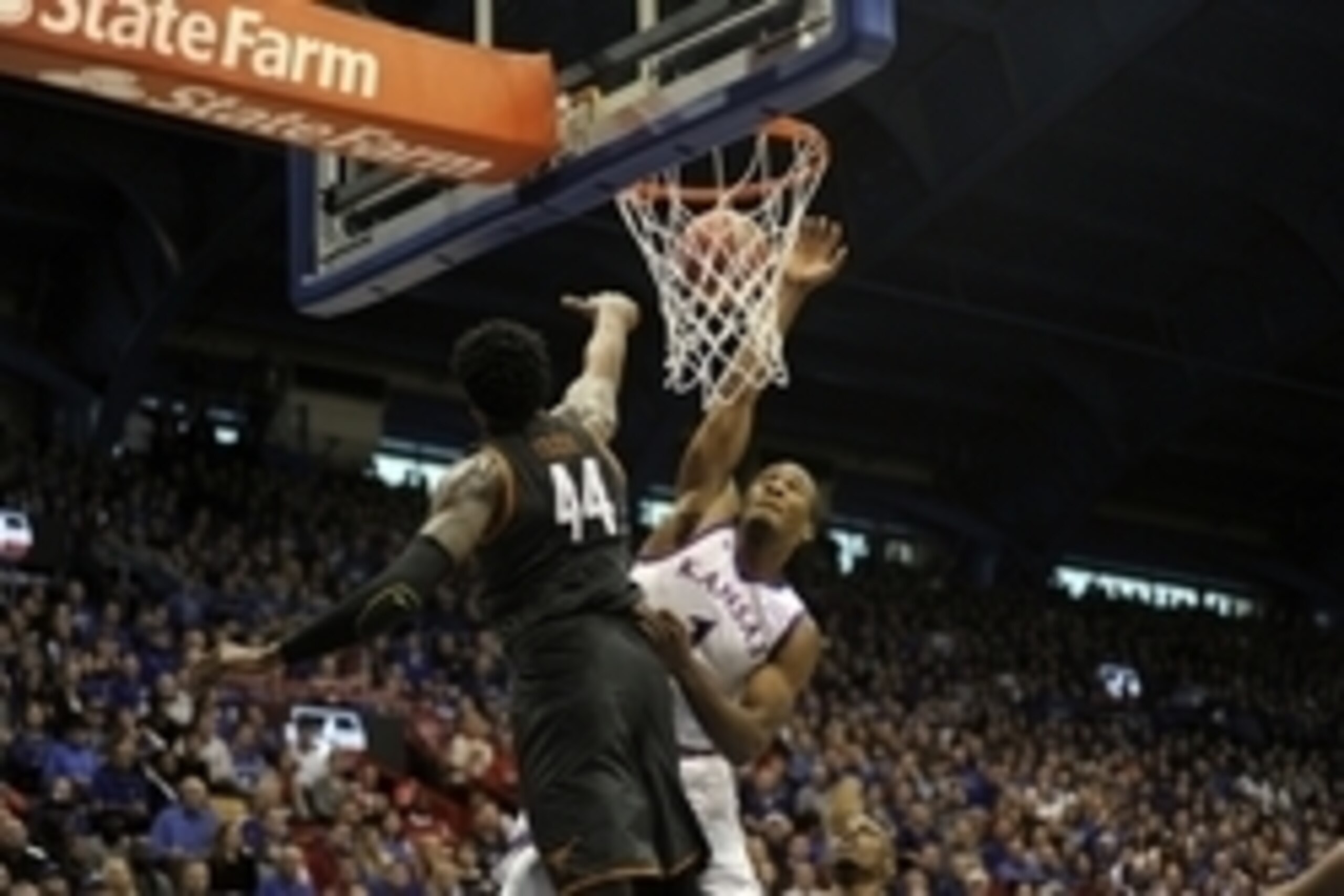Jan 23, 2016; Lawrence, KS, USA; Kansas Jayhawks guard Wayne Selden Jr. (1) drives to the basket against Texas Longhorns center Prince Ibeh (44) in the second half at Allen Fieldhouse. Kansas won the game 76-67. Mandatory Credit: John Rieger-USA TODAY Spo Jan 23, 2016; Lawrence, KS, USA; Kansas Jayhawks guard Wayne Selden Jr. (1) drives to the basket against Texas Longhorns center Prince Ibeh (44) in the second half at Allen Fieldhouse. Kansas won the game 76-67. Mandatory Credit: John Rieger-USA TODAY Spo