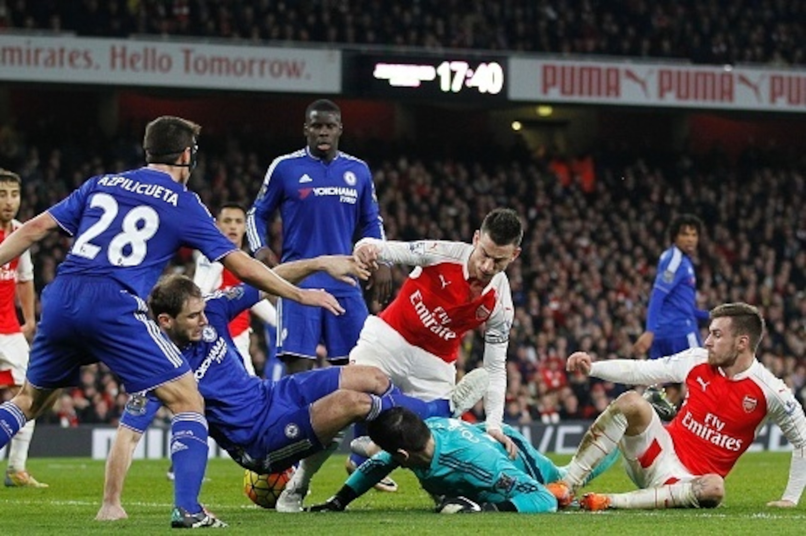 A scramble for the ball in the Chelsea penalty area late in the English Premier League football match between Arsenal and Chelsea at the Emirates Stadium in London on January 24, 2016. Chelsea won the game 1-0. AFP PHOTO / IKIMAGES

RESTRICTED TO EDITORIA