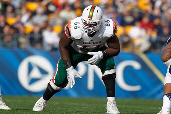 PITTSBURGH, PA - NOVEMBER 27:  Sunny Odogwu #66 of the Miami Hurricanes in action during the game against the Pittsburgh Panthers on November 27, 2015 at Heinz Field in Pittsburgh, Pennsylvania.  (Photo by Justin K. Aller/Getty Images)