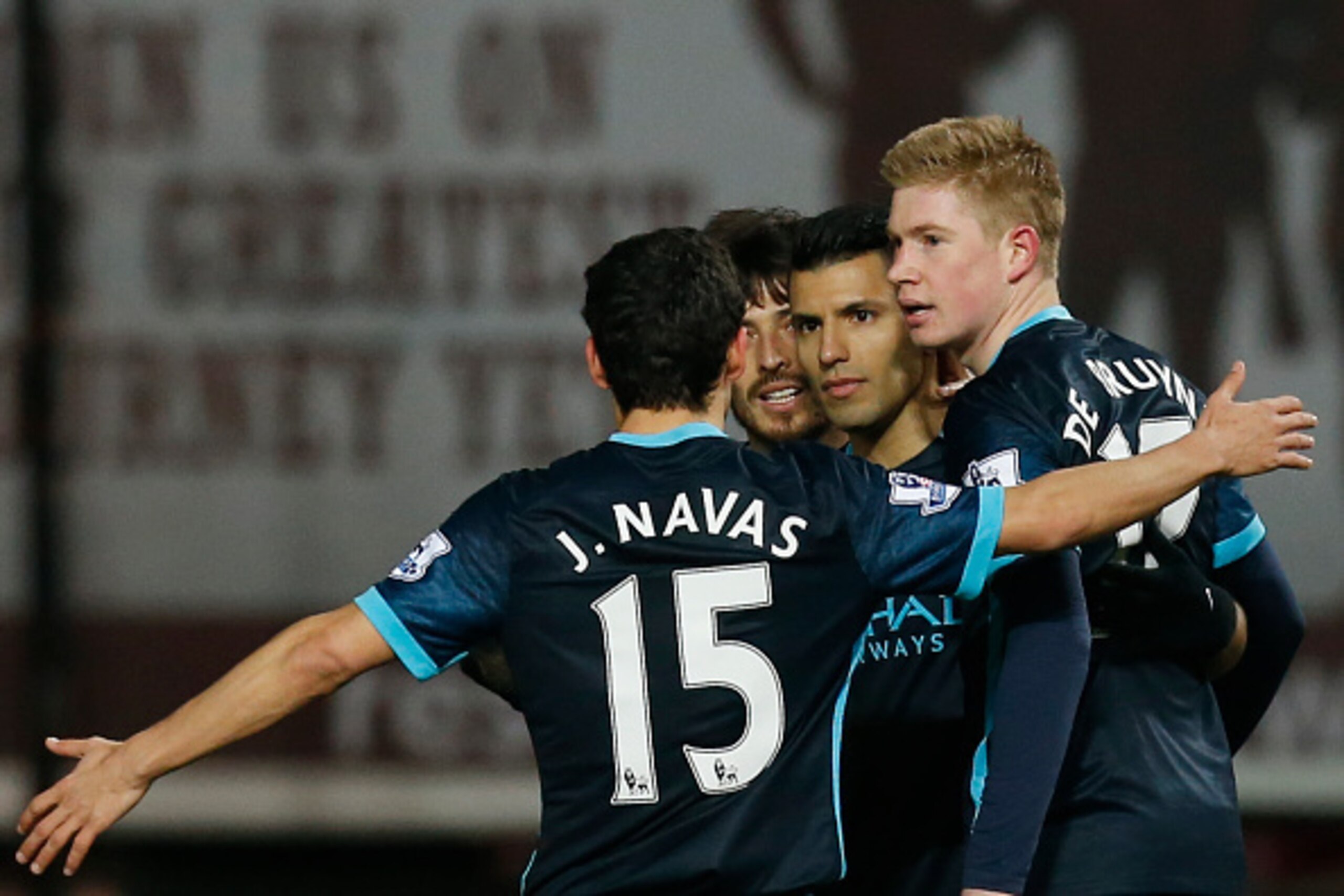 Manchester City's Argentinian striker Sergio Aguero (2R) celebrates scoring an equalising goal for 1-1 during the English Premier League football match between West Ham United and Manchester City at The Boleyn Ground in Upton Park, in east London on Janua