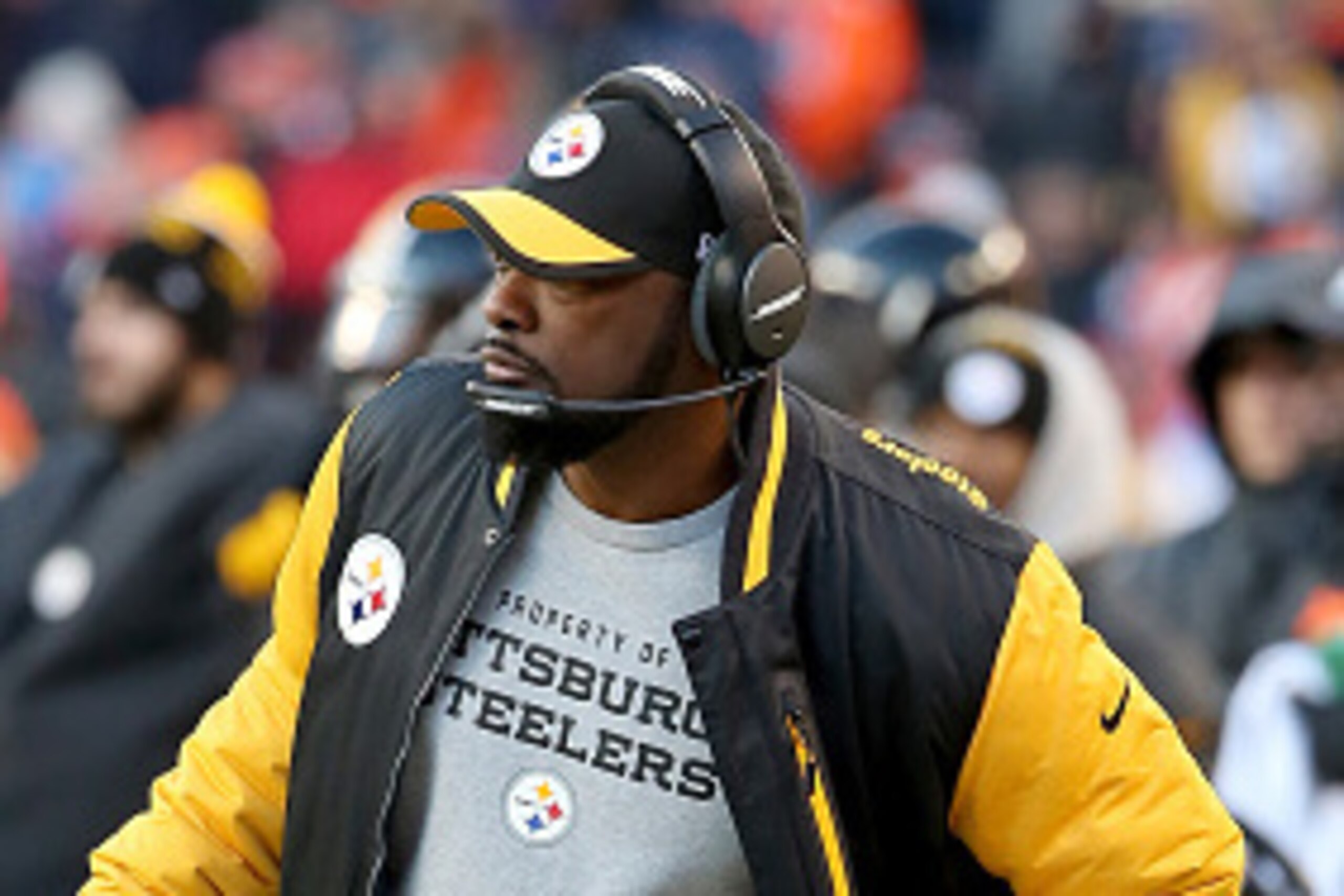 DENVER, CO - JANUARY 17: Head coach Mike Tomlin of the Pittsburgh Steelers walks along the sideline during the AFC Divisional Playoff Game against the Denver Broncos at Sports Authority Field at Mile High on January 17, 2016 in Denver, Colorado.  (Photo b