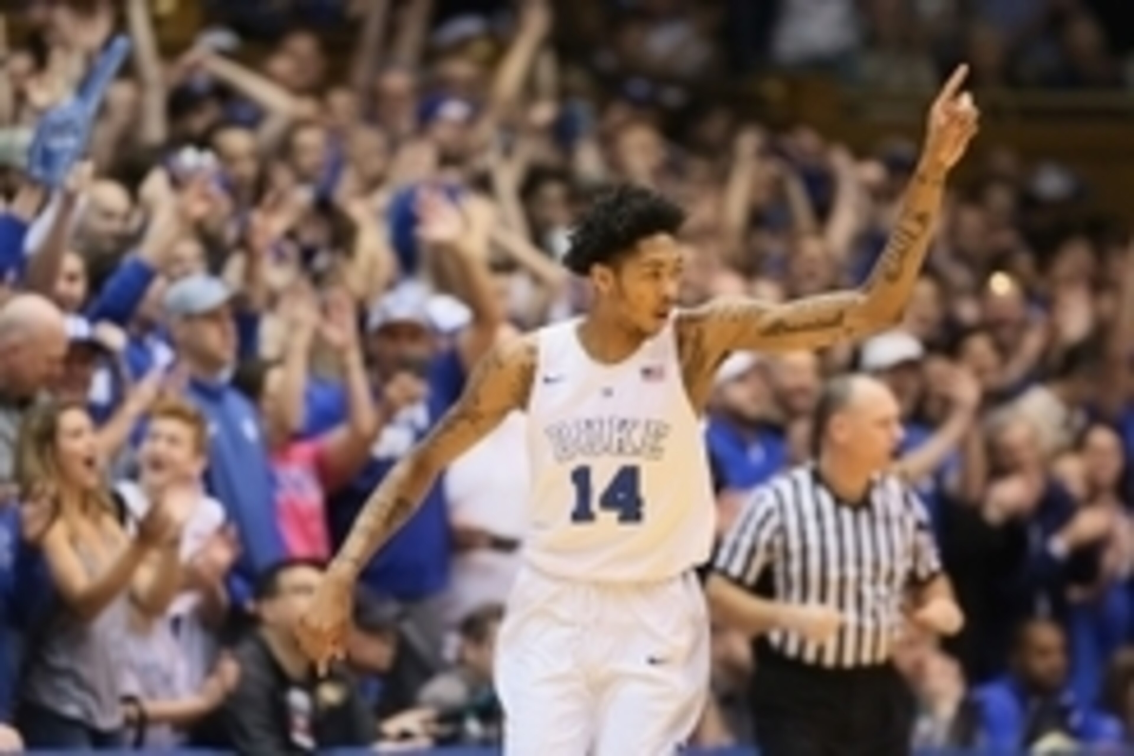 Jan 9, 2016; Durham, NC, USA; Duke Blue Devils guard Brandon Ingram (14) reacts after hitting a three point shot in their game against the Virginia Tech Hokies at Cameron Indoor Stadium. Mandatory Credit: Mark Dolejs-USA TODAY Sports
