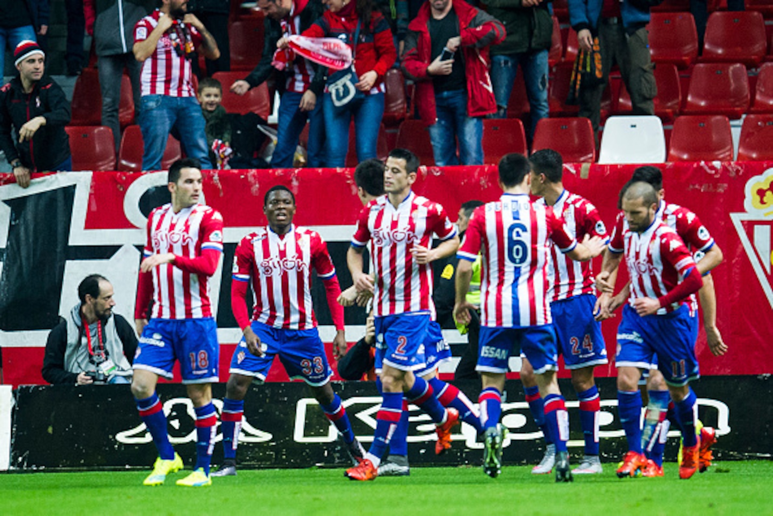 GIJON, SPAIN - JANUARY 22: Daniel Ndi (2ndL) of Real Sporting de Gijon celebrates after scoring his team's second goal during the La Liga match between Real Sporting de Gijon and Real Sociedad de Futbol at Estadio El Molinon on January 22, 2016 in Gijon, GIJON, SPAIN - JANUARY 22: Daniel Ndi (2ndL) of Real Sporting de Gijon celebrates after scoring his team's second goal during the La Liga match between Real Sporting de Gijon and Real Sociedad de Futbol at Estadio El Molinon on January 22, 2016 in Gijon,