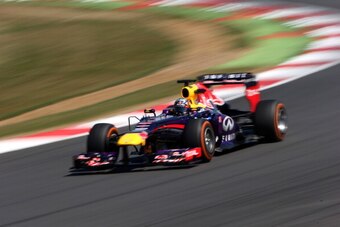 NORTHAMPTON, ENGLAND - JULY 19:   Carlos Sainz Jr of Spain drives the Infiniti Red Bull Racing car during the young drivers test at Silverstone Circuit on July 19, 2013 in Northampton, England.  (Photo by Mark Thompson/Getty Images)
