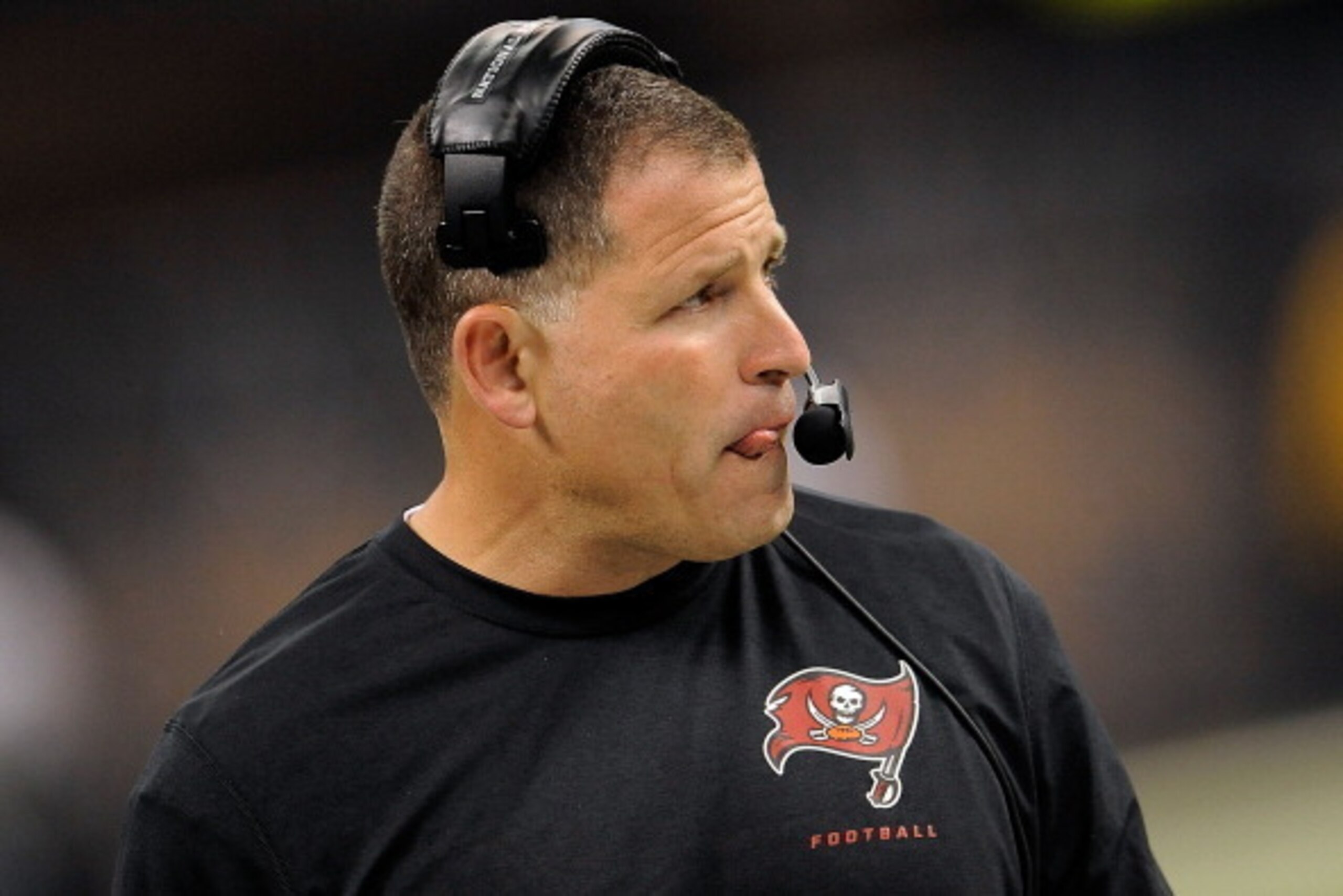 NEW ORLEANS, LA - DECEMBER 29:  Greg Schiano, head coach of the Tampa Bay Buccaneers, watches action during a game against the New Orleans Saints at the Mercedes-Benz Superdome on December 29, 2013 in New Orleans, Louisiana.  New Orleans won the game 42-1