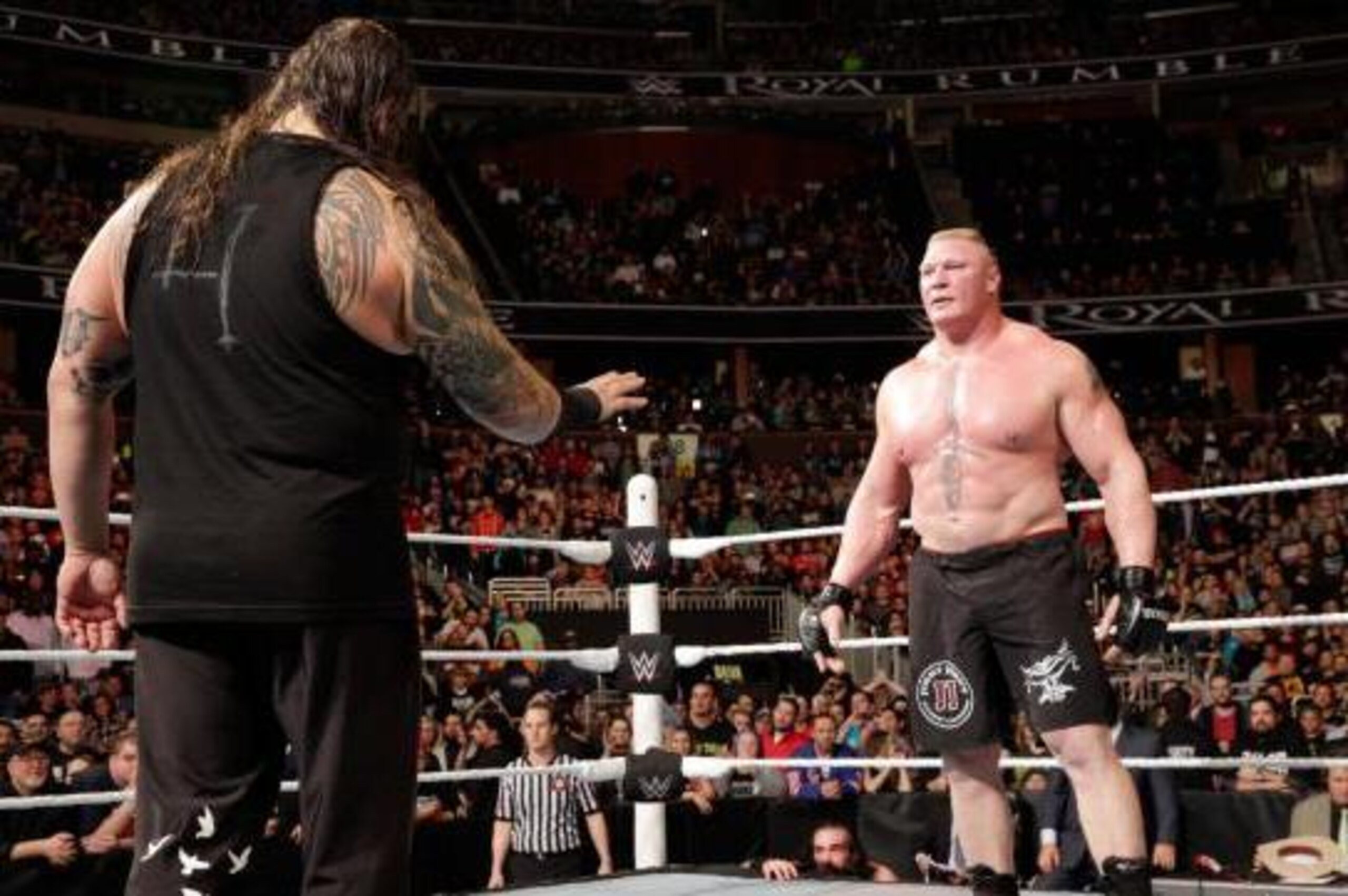 Bray Wyatt and Brock Lesnar face off.