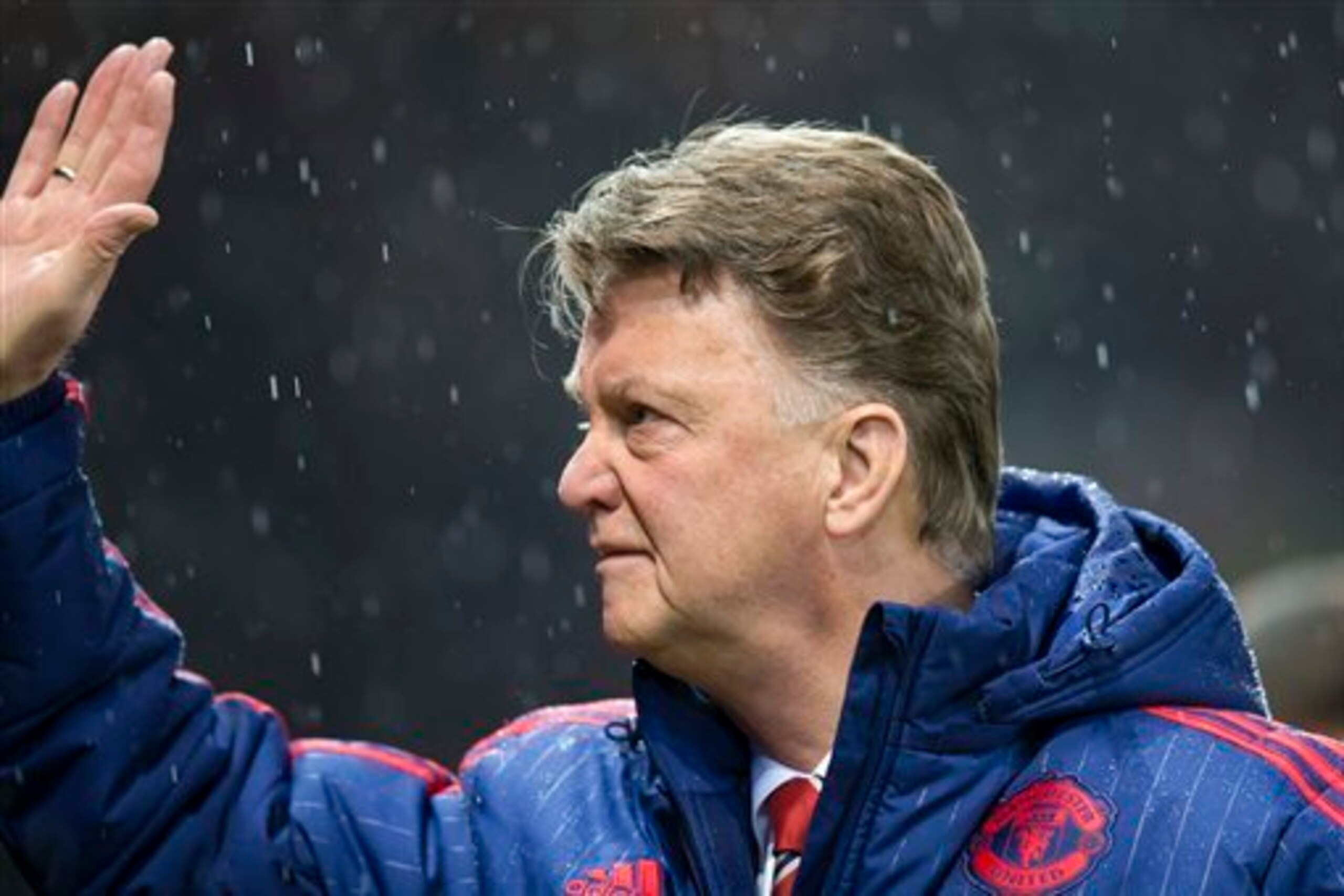Van Gaal acknowledges the crowd at Old Trafford.