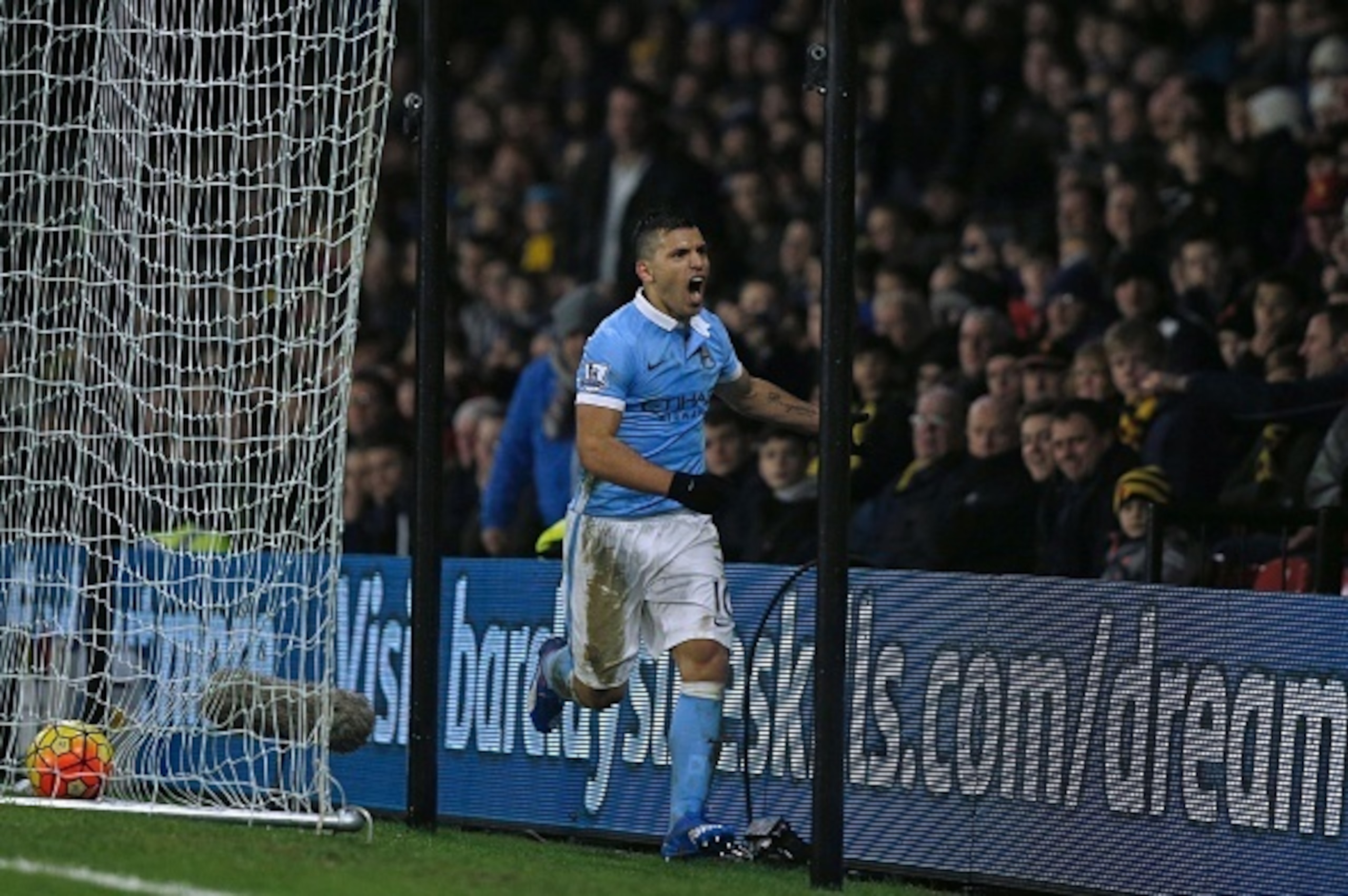Manchester City's Argentinian striker Sergio Aguero celebrates after scoring their second goal during the English Premier League football match between Watford and Manchester City at Vicarage Road Stadium in Watford, north of London on January 2, 2016. Ma