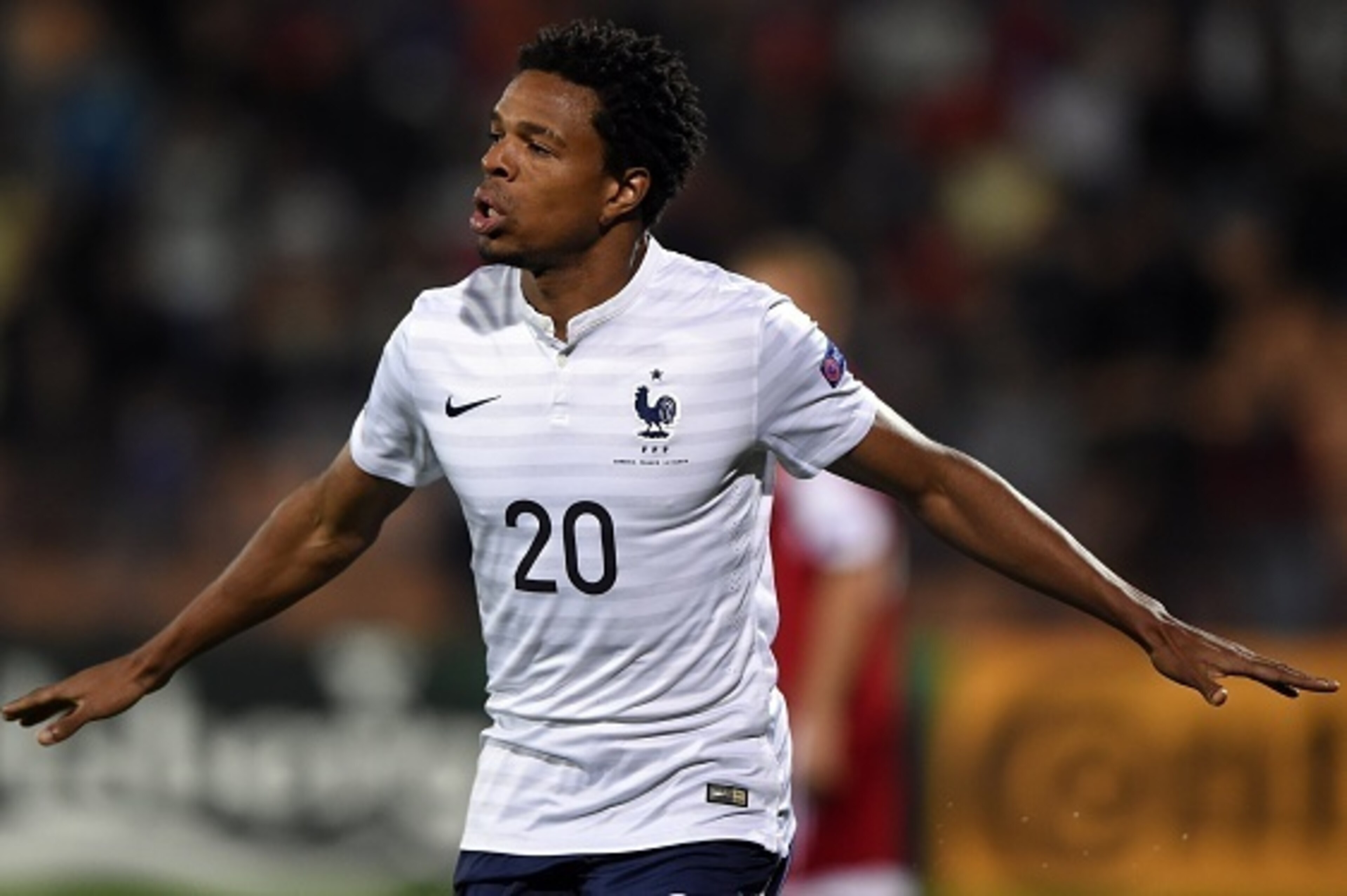 France's forward Loic Remy celebrates after scoring a goal during a friendly football match between Armenia and France at the Republican Stadium in Yerevan on October 14, 2014.  AFP PHOTO / FRANCK FIFE        (Photo credit should read FRANCK FIFE/AFP/Gett