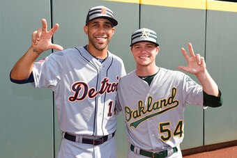 CINCINNATI, OH - JULY 14:  American League All-Stars David Price #14 of the Detroit Tigers and Sonny Gray #54 of the Oakland Athletics hold up the Vanderbilt University 'VU' hand sign prior to the 86th MLB All-Star Game at Great American Ball Park on July