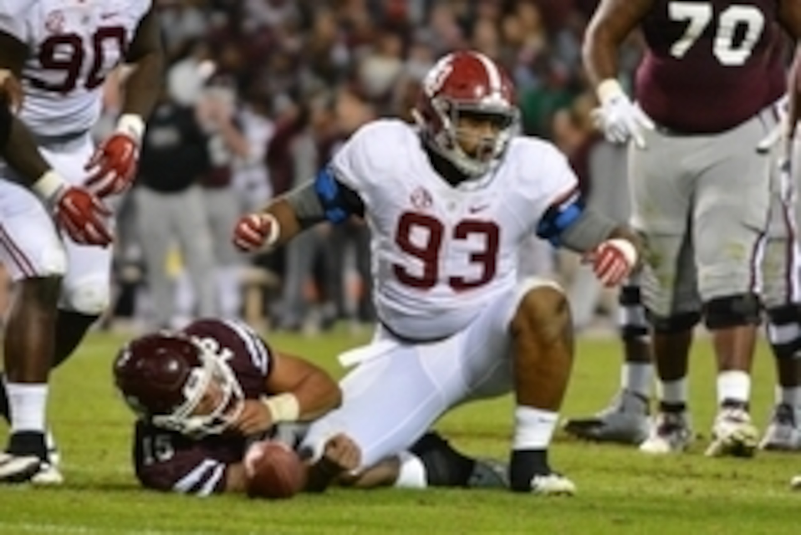 Nov 14, 2015; Starkville, MS, USA; Alabama Crimson Tide defensive lineman Jonathan Allen (93) reacts after tackling Mississippi State Bulldogs quarterback Dak Prescott (15) during the game at Davis Wade Stadium. Alabama won 31-6.  Mandatory Credit: Matt B