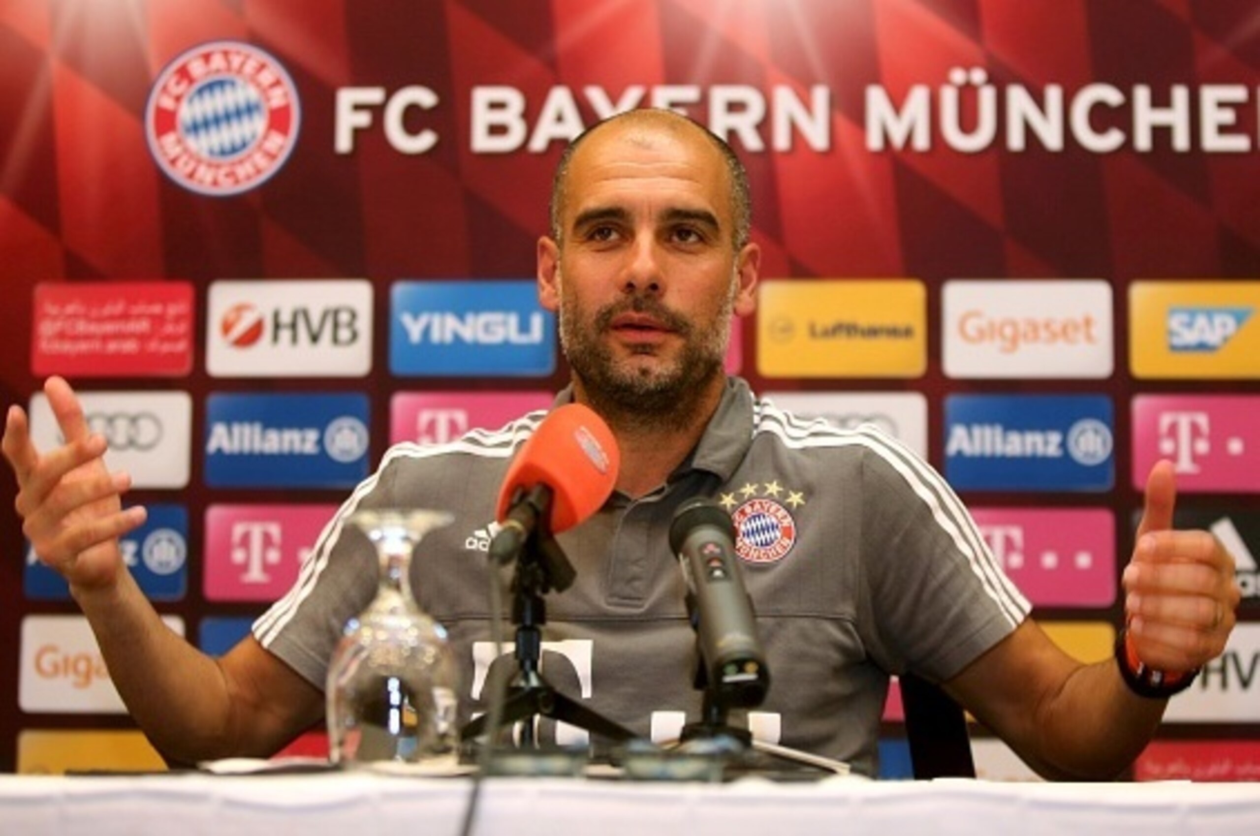 Bayern Munich's Spanish head coach Pep Guardiola speaks during a press conference at Aspire Academ in the Qatari capital Doha on January 11, 2016. / AFP / STRINGER (Photo credit should read STRINGER/AFP/Getty Images) Bayern Munich's Spanish head coach Pep Guardiola speaks during a press conference at Aspire Academ in the Qatari capital Doha on January 11, 2016. / AFP / STRINGER (Photo credit should read STRINGER/AFP/Getty Images)